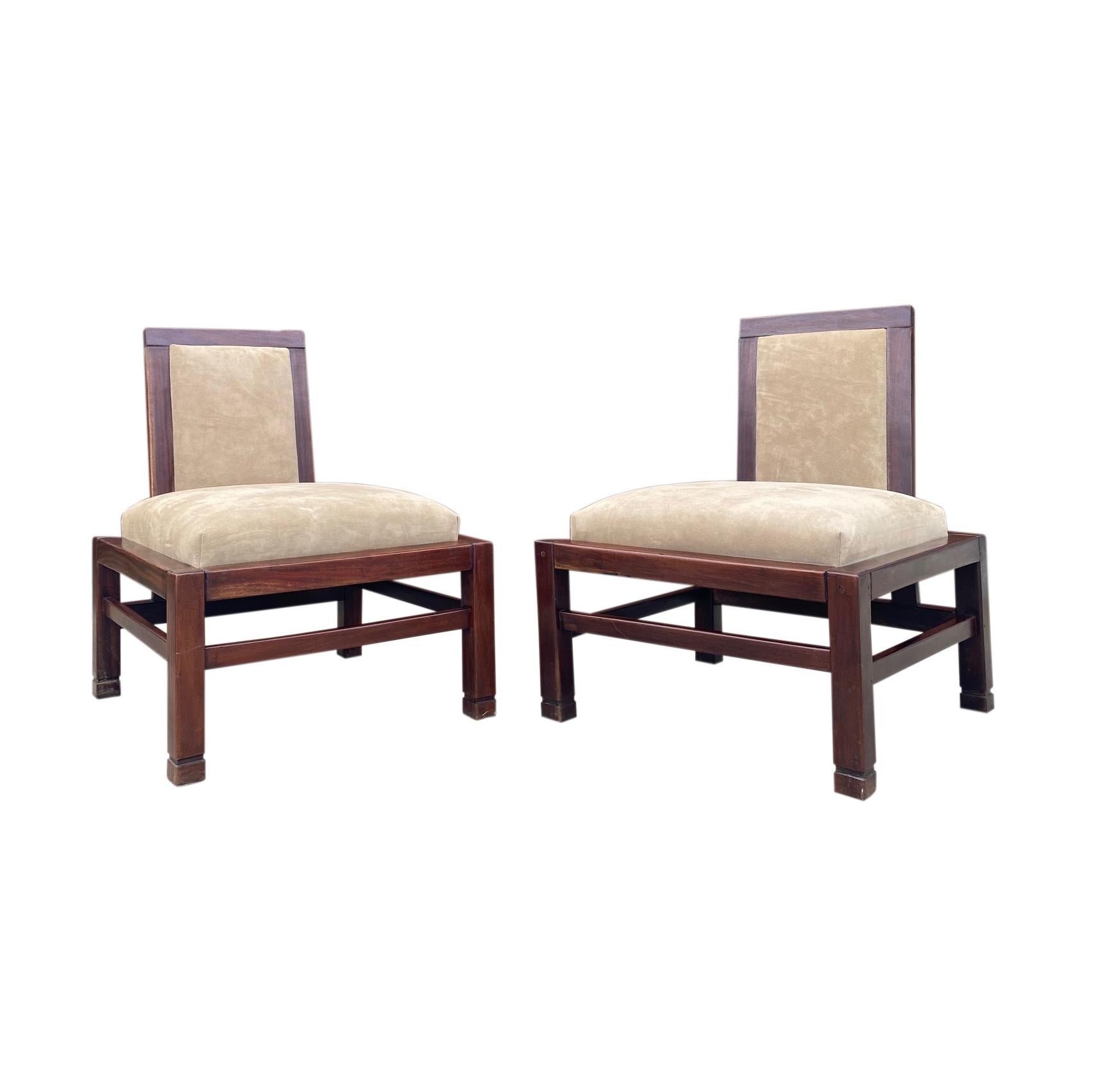 Pair of solid mahogany with new custom suede upholstery slipper chairs. Square profile frames support inset backrests and have subtle Far East Asian influences. Solid wood frames with visible through-tenon joinery reminiscent of early Japanese