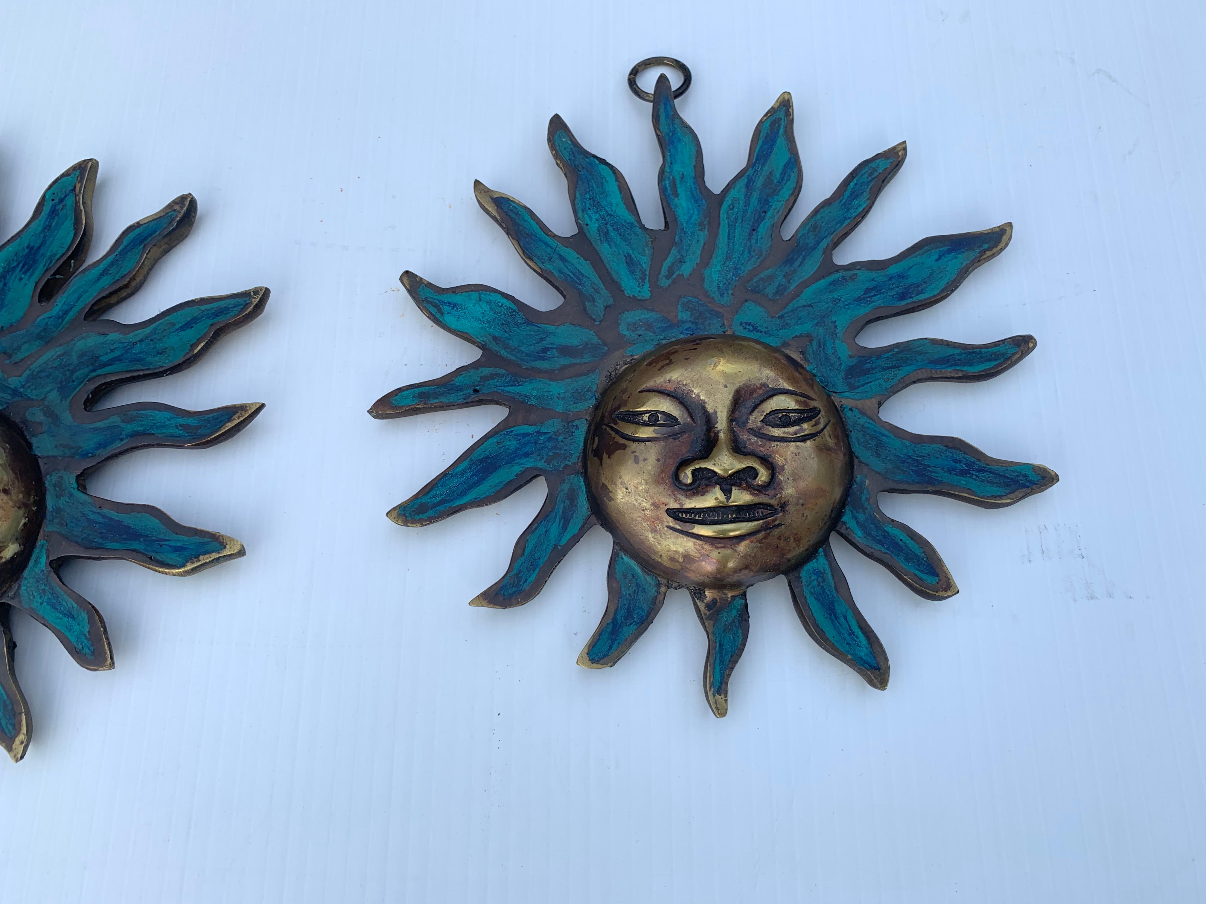 Pair of Malachite sun god in the style of Pepe Mendoza ornament wall sculptures.