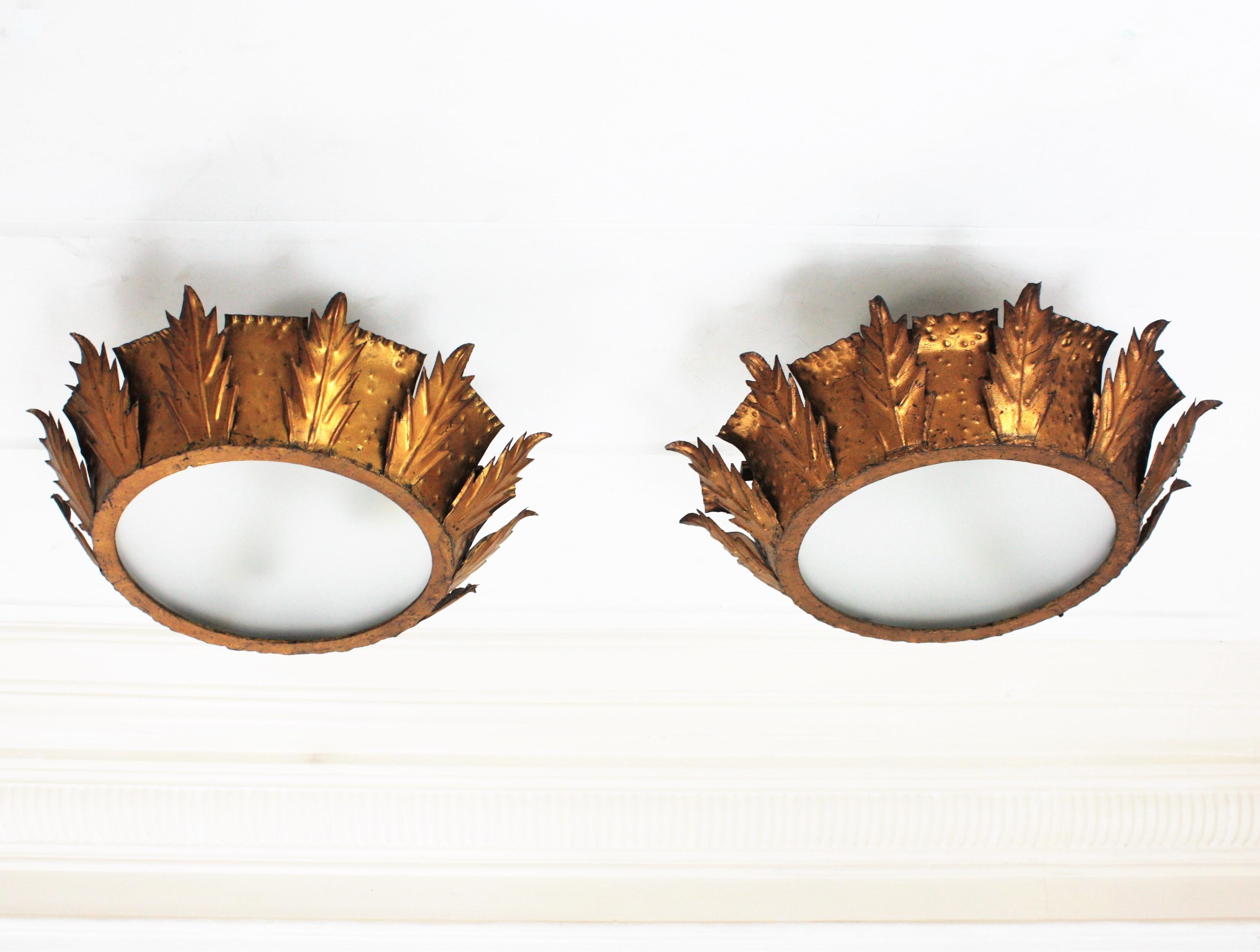Brutalist Pair of Spanish Sunburst Crown Light Fixtures in Gilt Iron, 1950s For Sale