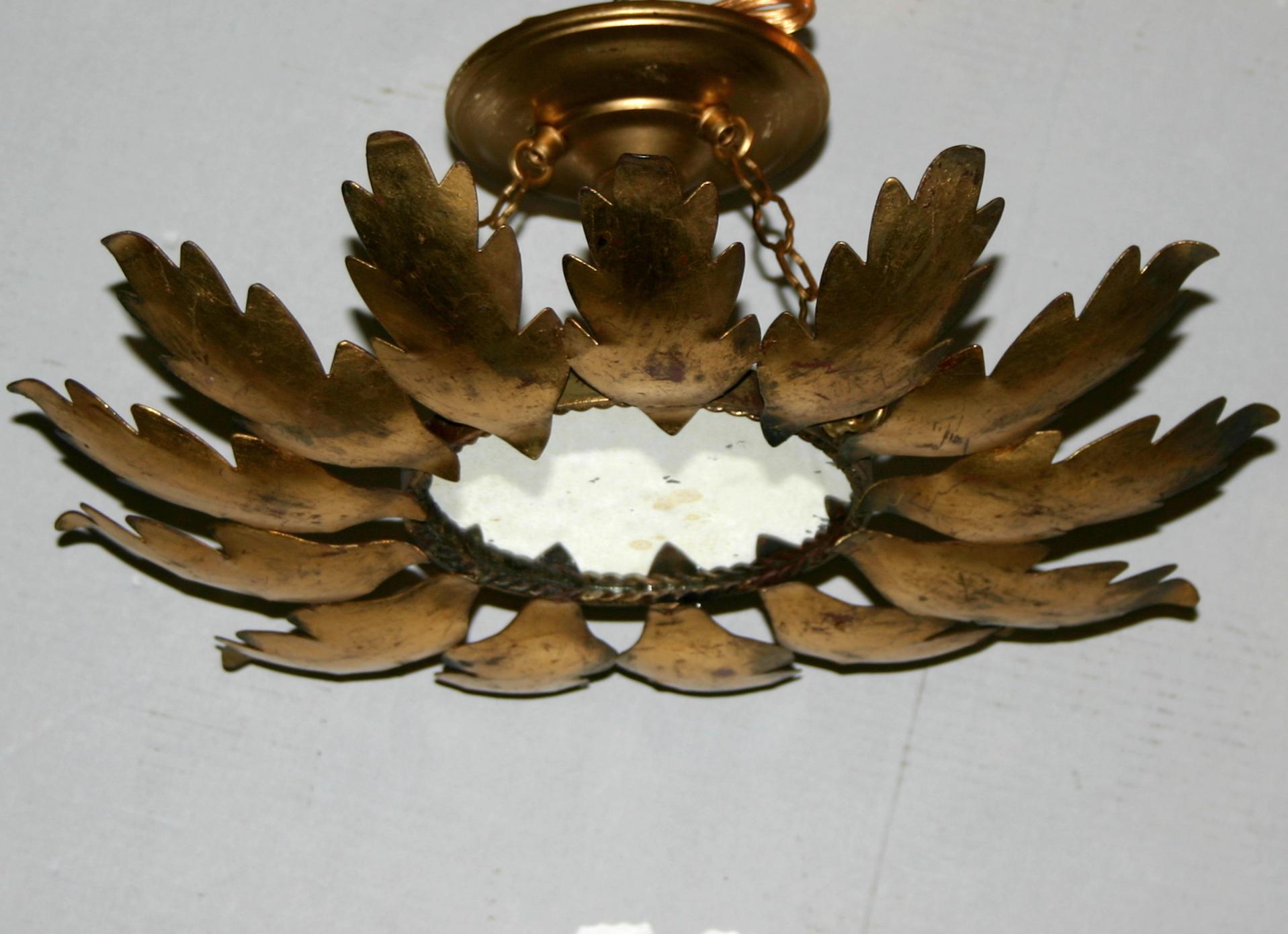 Pair of Sunburst Light Fixtures, Sold Individually In Good Condition For Sale In New York, NY