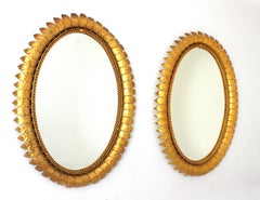 Pair of Sunburst Oval Mirrors in Gilt Metal, 1950s