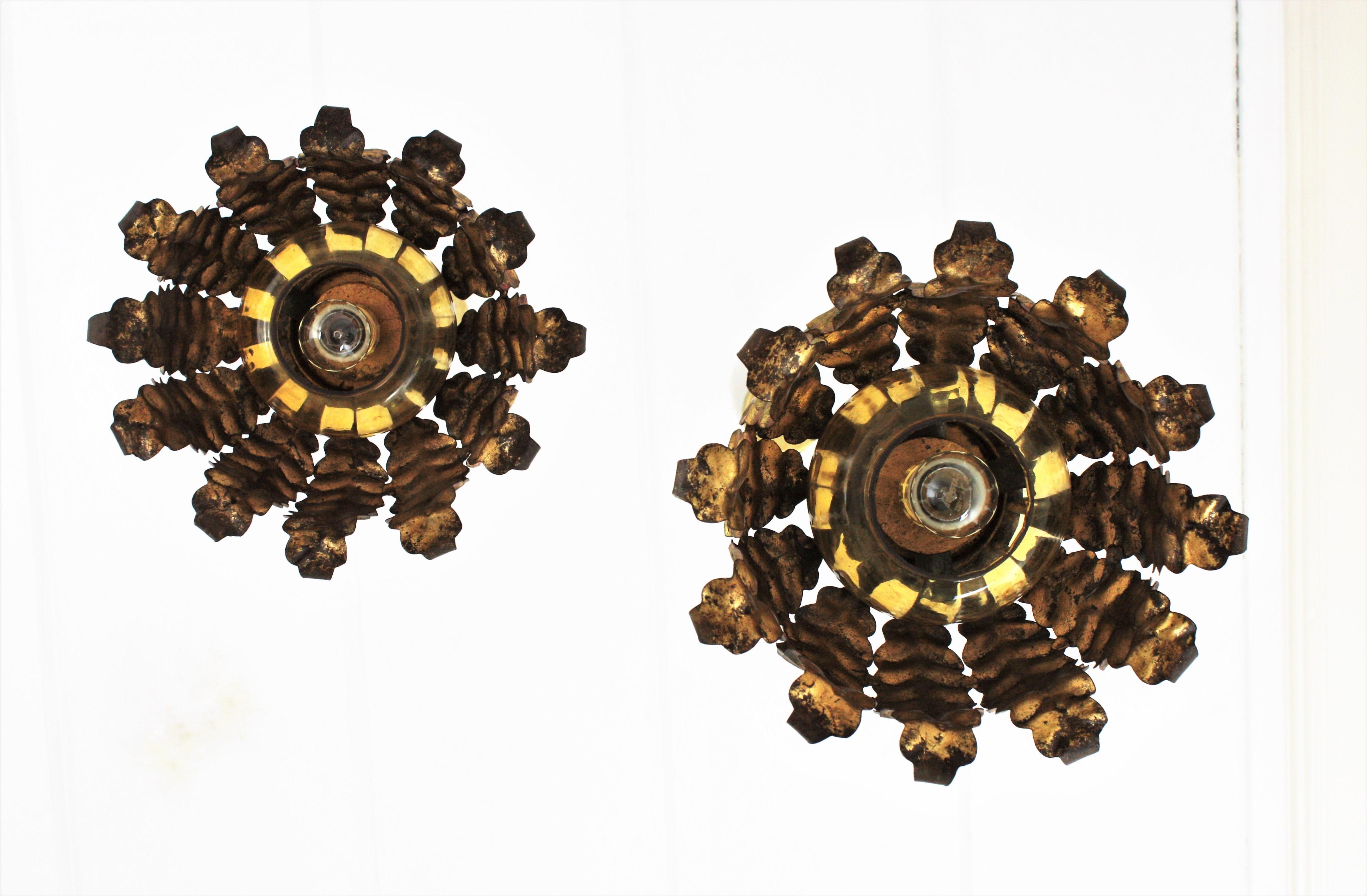 Pair of Spanish Sunburst Pendant Lights in Gilt Iron and Amber Glass For Sale 8