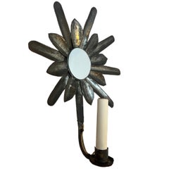 Paire d'appliques en forme de soleil