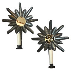 Paire d'appliques en forme de soleil