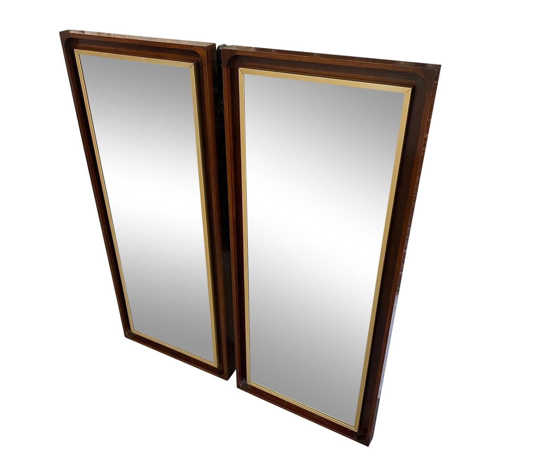 Rare Matching pair of midcentury Paul McCobb for H. Sacks and Sons walnut wall mirrors #8075 are in wonderful condition. Super simple design 18