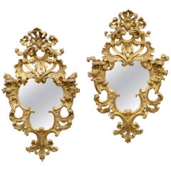 Pair of Superior French Louis XIV Transitional Baroque Carved Giltwood Mirrors
