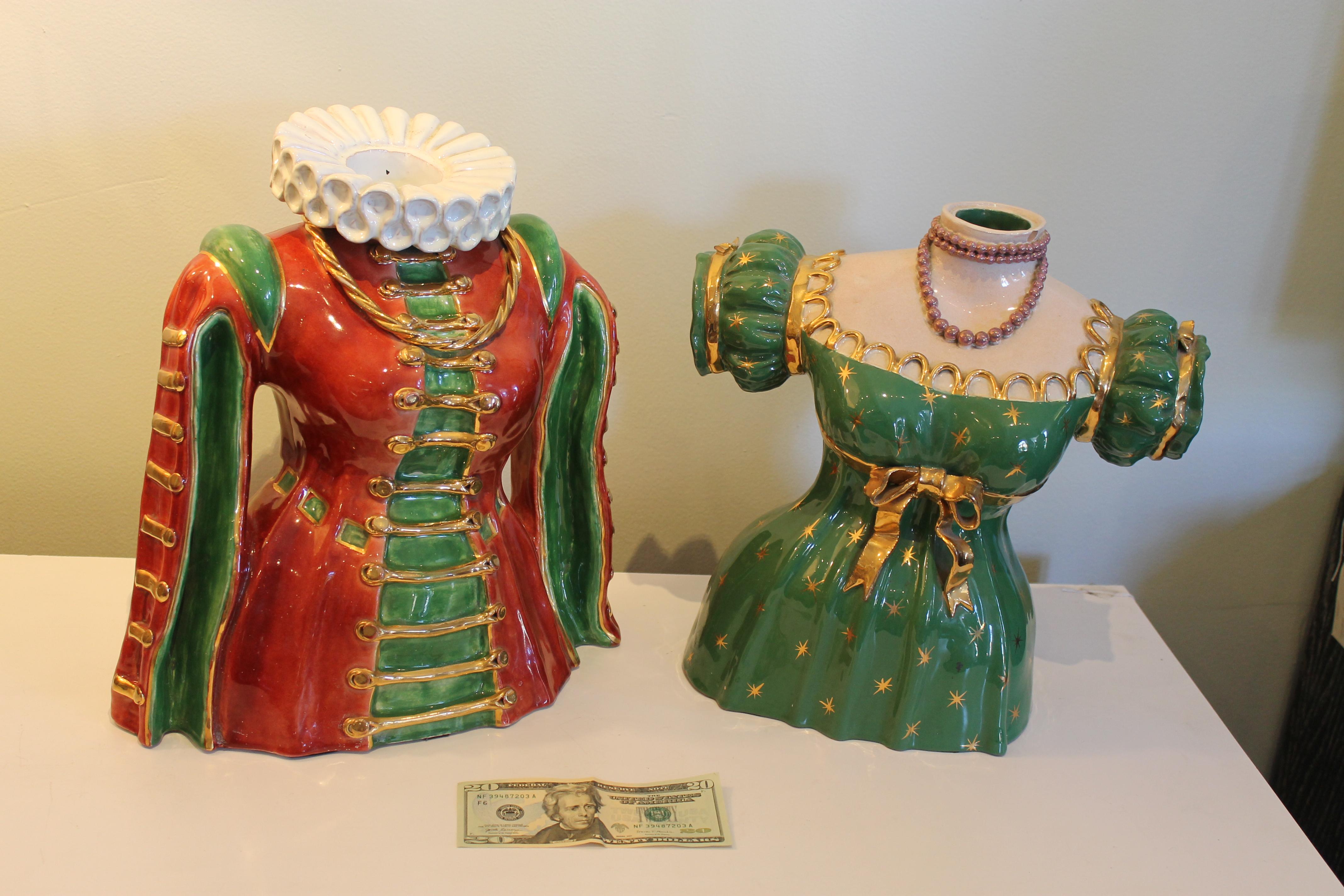 Large and bizarre pair of glazed terracotta vases, surrealist dress forms with Elizabethan costume. The larger of the two, with the ruffled collar, is 14