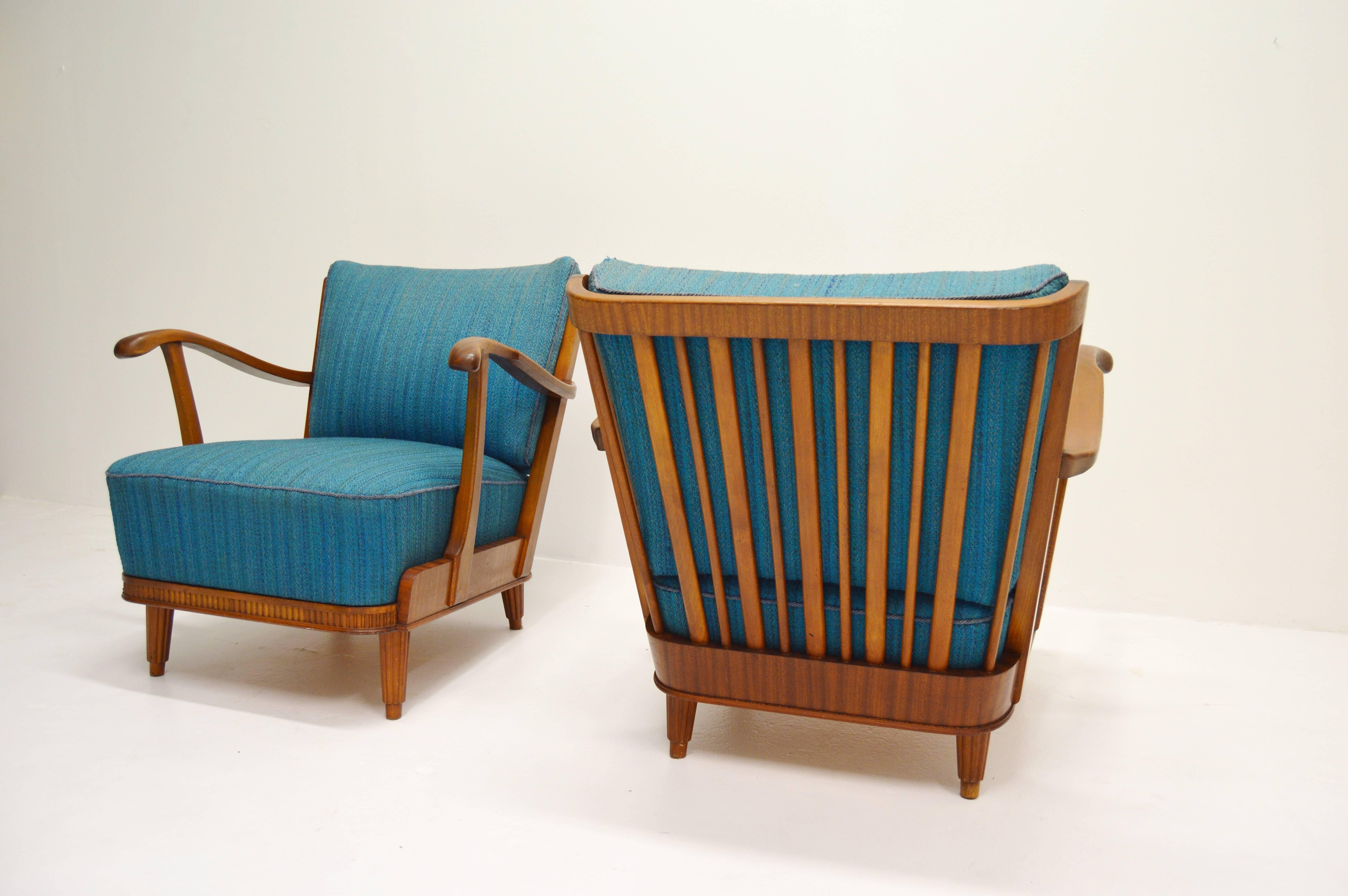 Elegant midcentury lounge chairs designed by Swedish Svante Skogh for Förenade Möbelfabrikerna Linköping in Sweden.
Mahogany and elmwood.