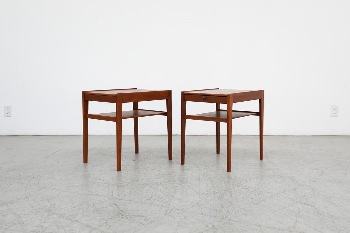 Model 'Dixi' pair of Mid-Century modern teak side tables or night stands designed by Gunnar Myrstrand and Sven Engström for Tingströms, Sweden 1960. Tables can be used as nightstands, or side tables. Each table has a small locking drawer and a lower