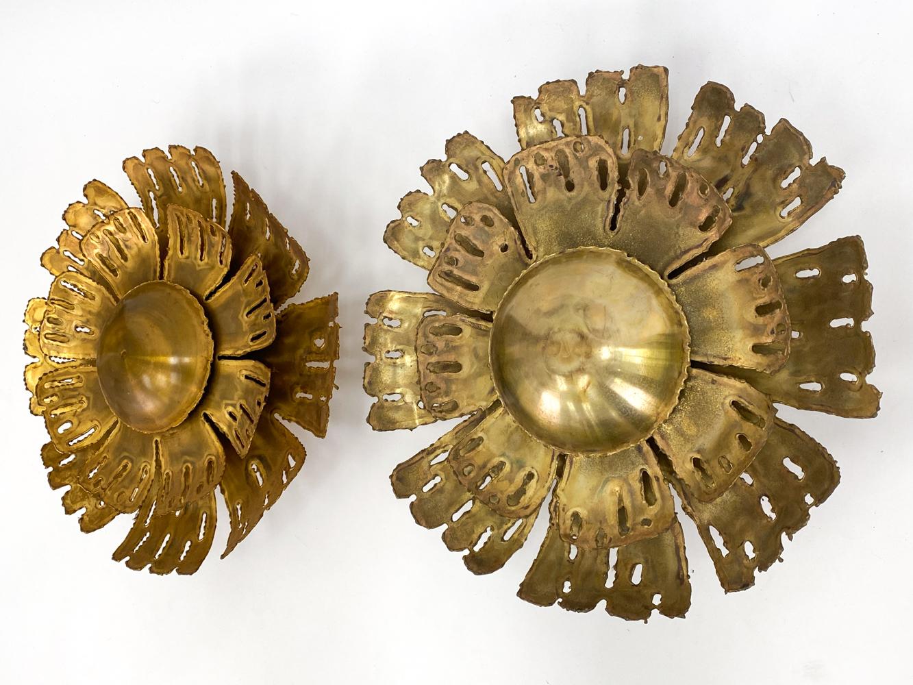 Add bold and playful glamor to your space with this exquisite pair of sconces, crafted from torch-cut brass in the form of blooming flowers, designed by Svend Aage Holm Sørensen and produced by his firm Holm Sørensen & Pedersen Belysning in the