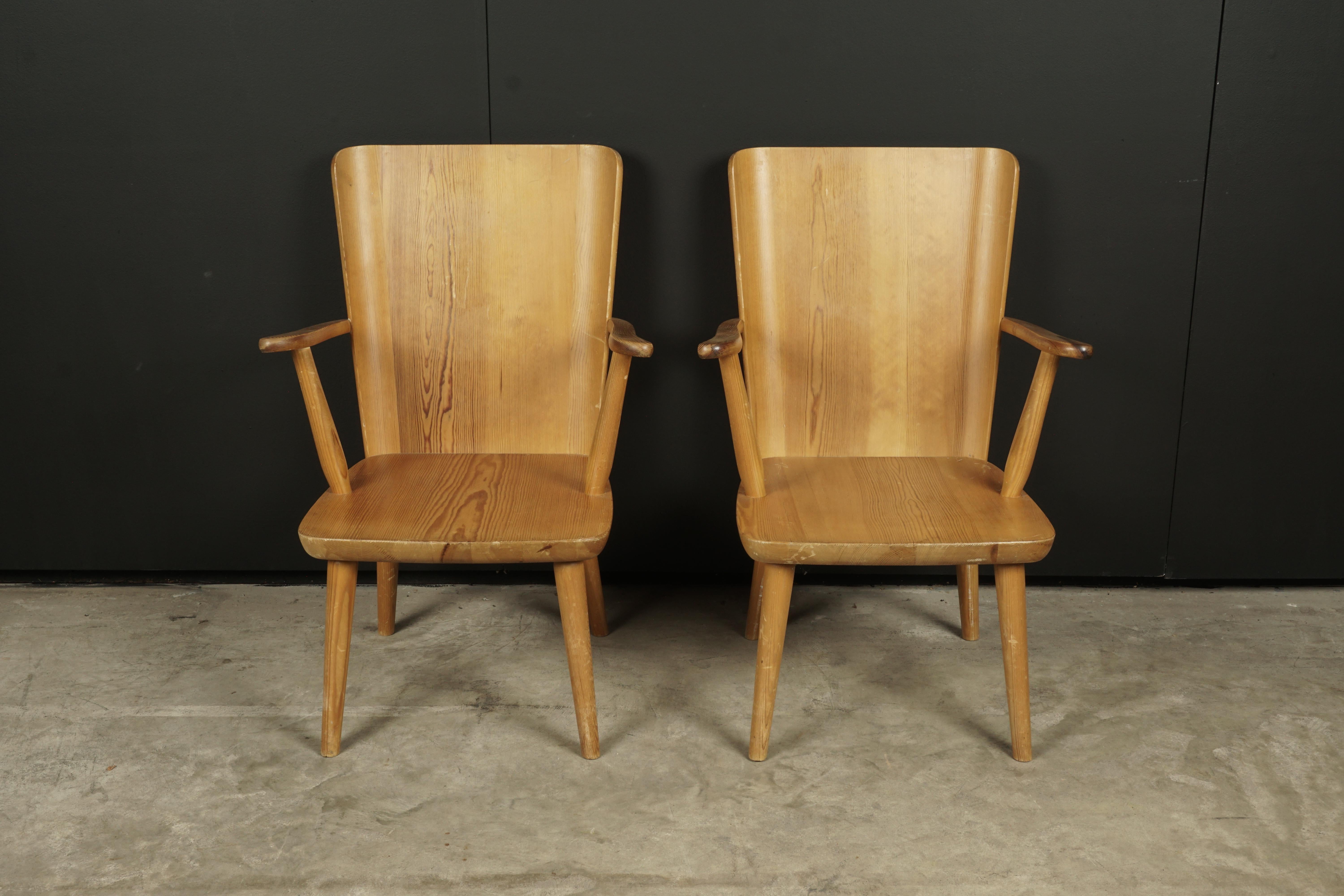 Vintage pair of Svensk fur armchairs designed by Göran Malmvall, Sweden, circa 1940. Solid pine construction with light wear and patina.