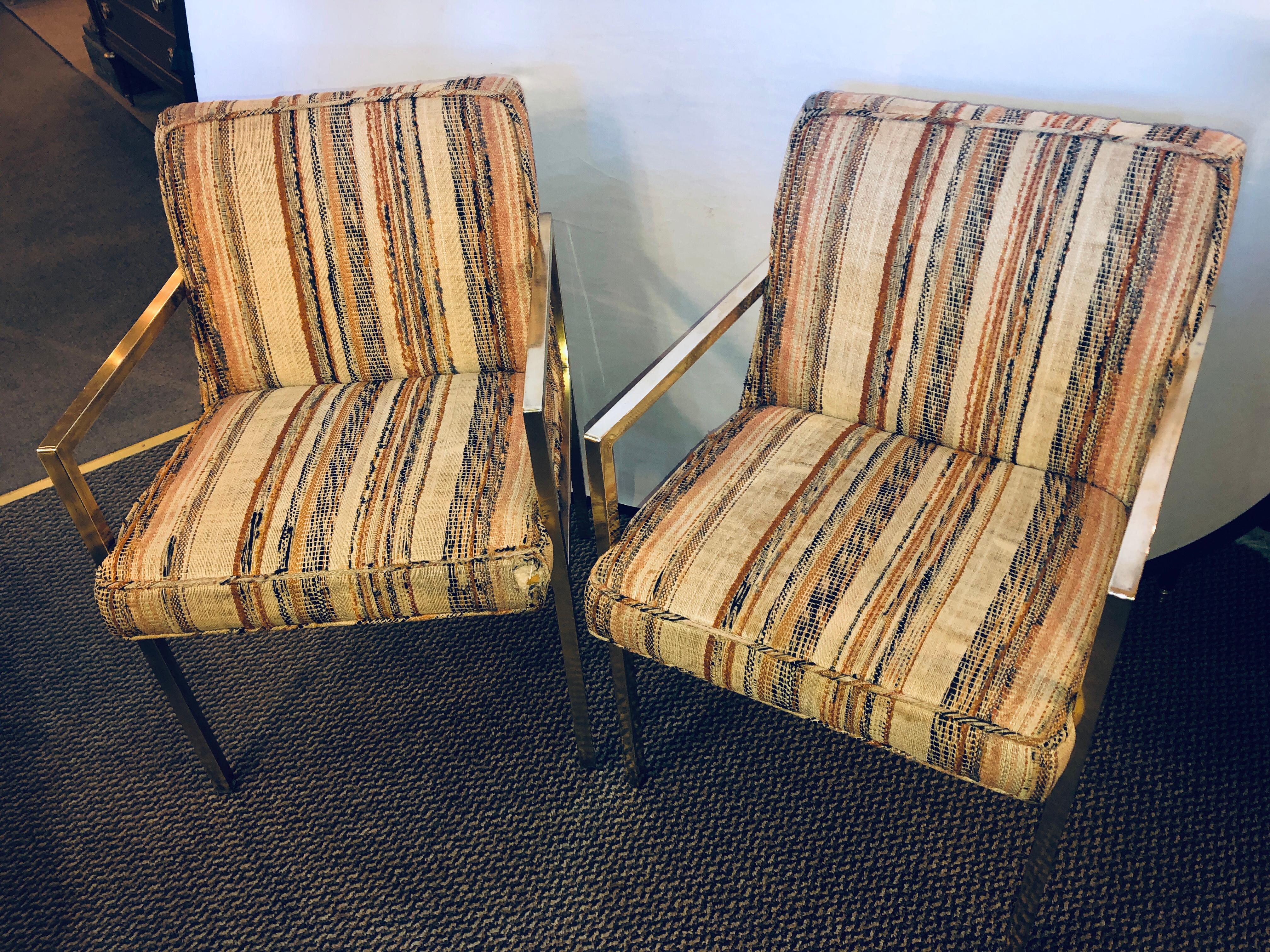 Pair of Swaim bronze patinated open armchairs. A pair of bronze patinated Mid-Century Modern open armchairs by Swaim Designs with vintage upholstery, possibly original, one with original paper tag dated 1975. (MORT1001/2) (TC) Dimensions: 32