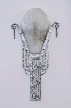Pair of "Swallows" model wall lights by Marius Ernest SABINO