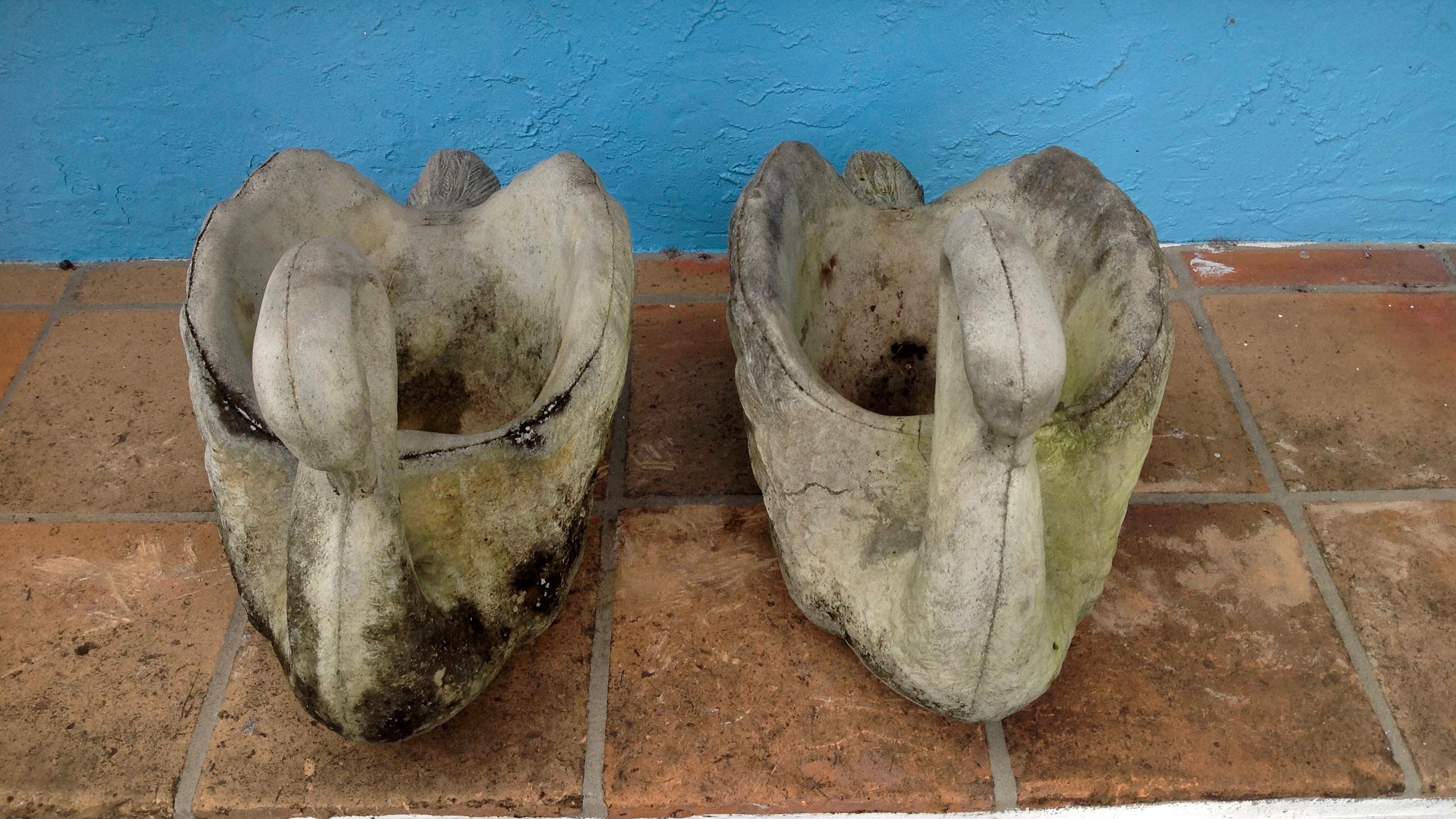 Substantial and dramatic form cast as figures of swans.
The planters have a good and earthy patina.
(A second pair is also available). Price shown is for one pair only.