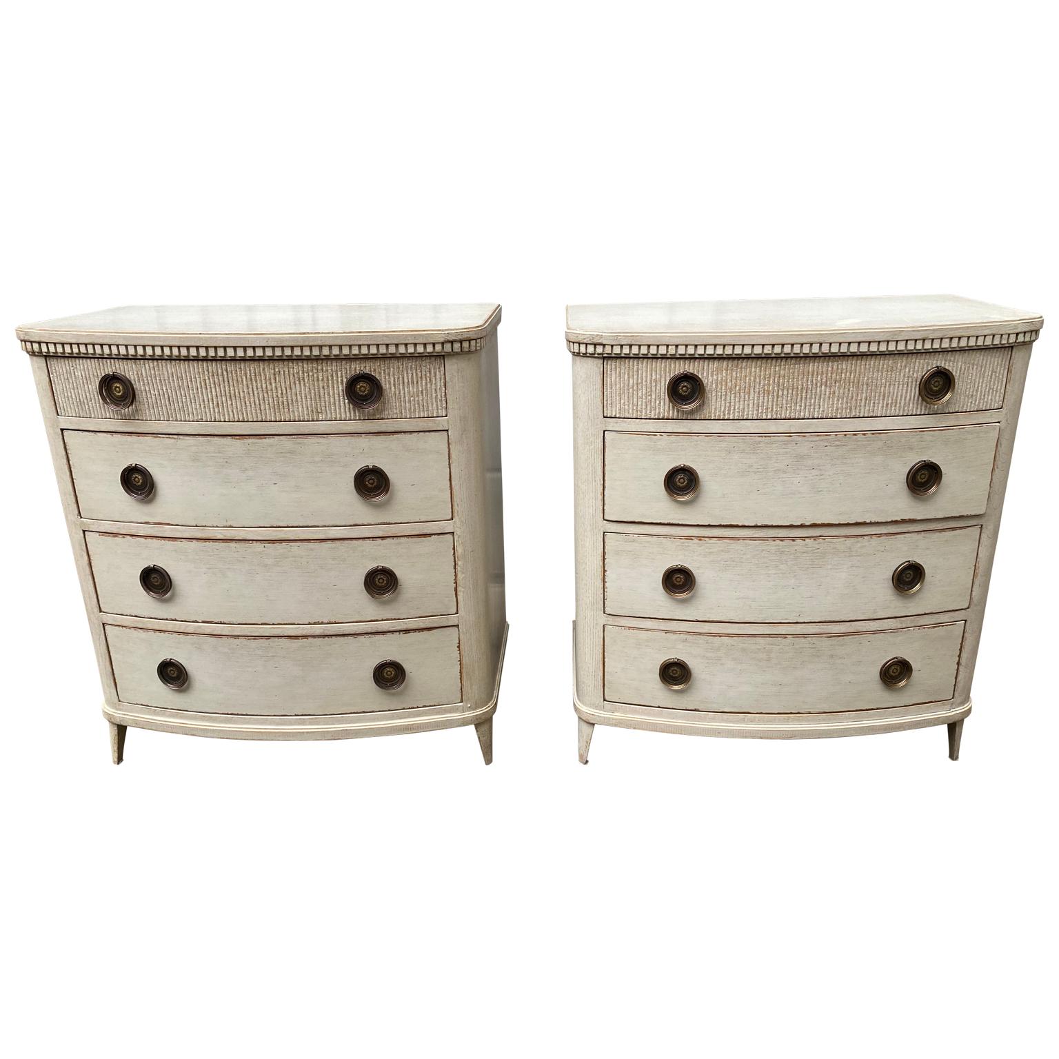 Pair of Scandinavian 19th century painted four-drawer commodes with brass hardware.