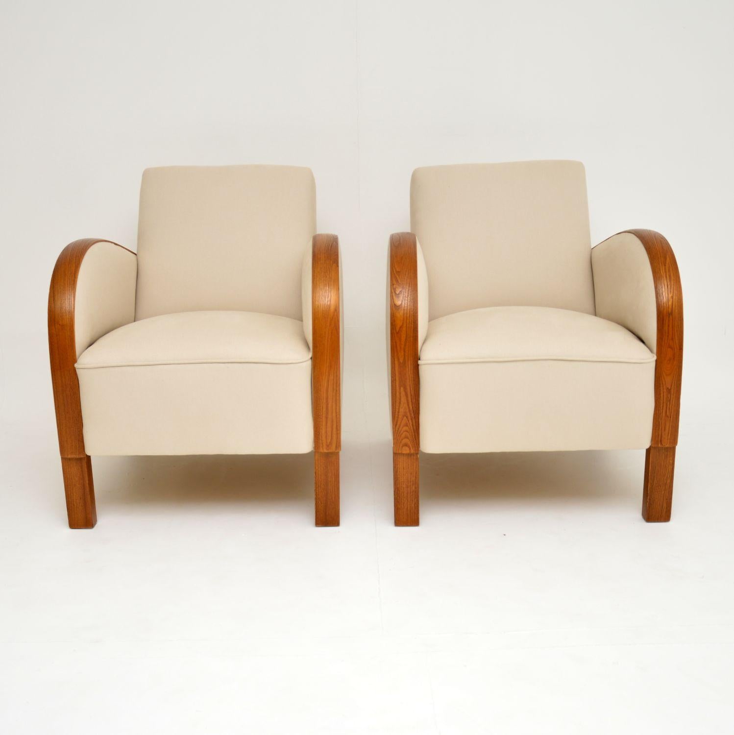 This pair of original Swedish Art Deco armchairs are very stylish and comfortable too.

They date from circa 1930s and have just come over from Sweden, been re-polished and re-upholstered in a natural cotton cream fabric. They have been