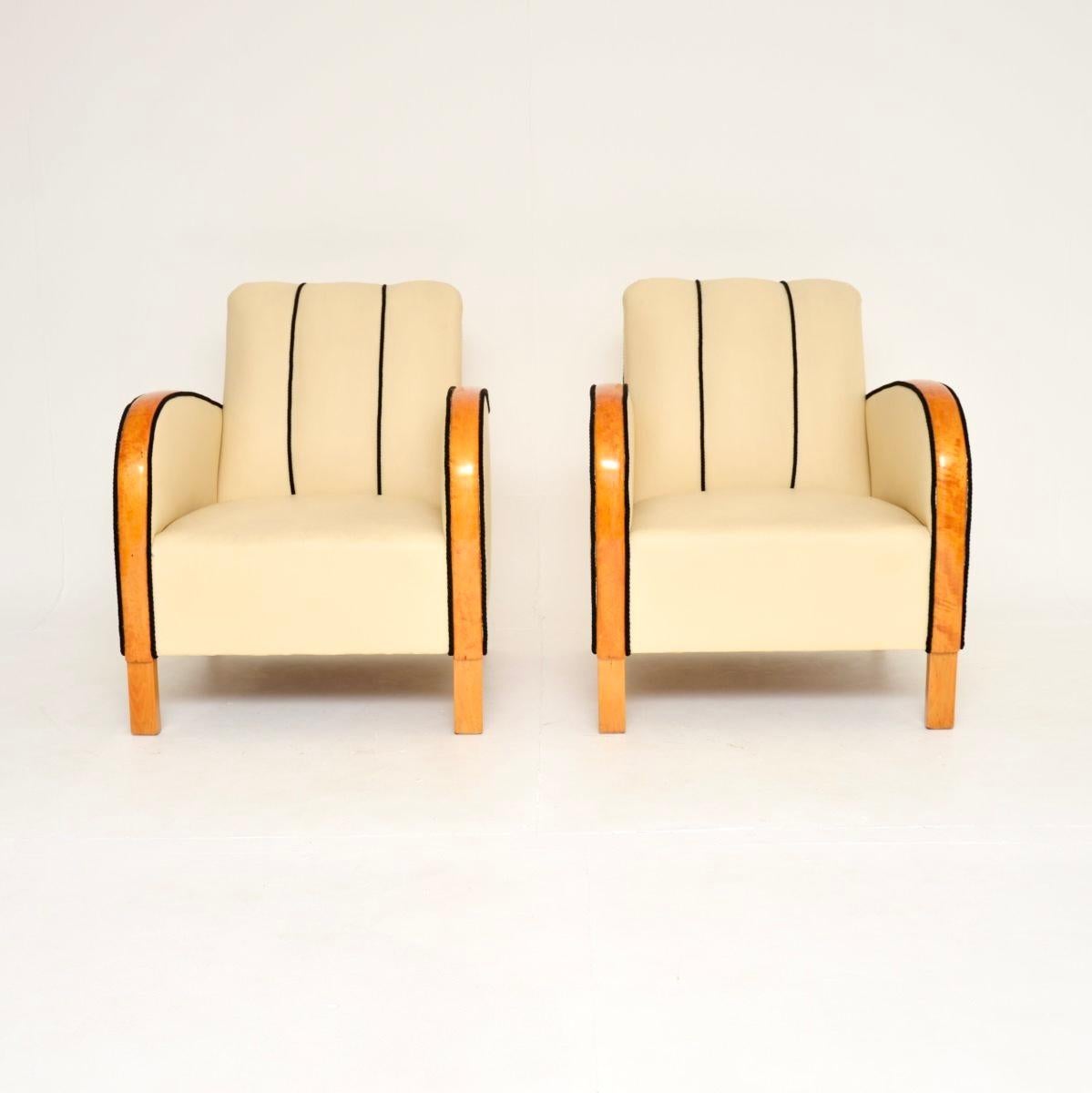 A stylish and very well made pair of Swedish Art Deco armchairs in leather and satin birch. They were recently imported from Sweden, they date from the 1930’s,

The quality is excellent, they are well sprung and very comfortable. The sweeping satin
