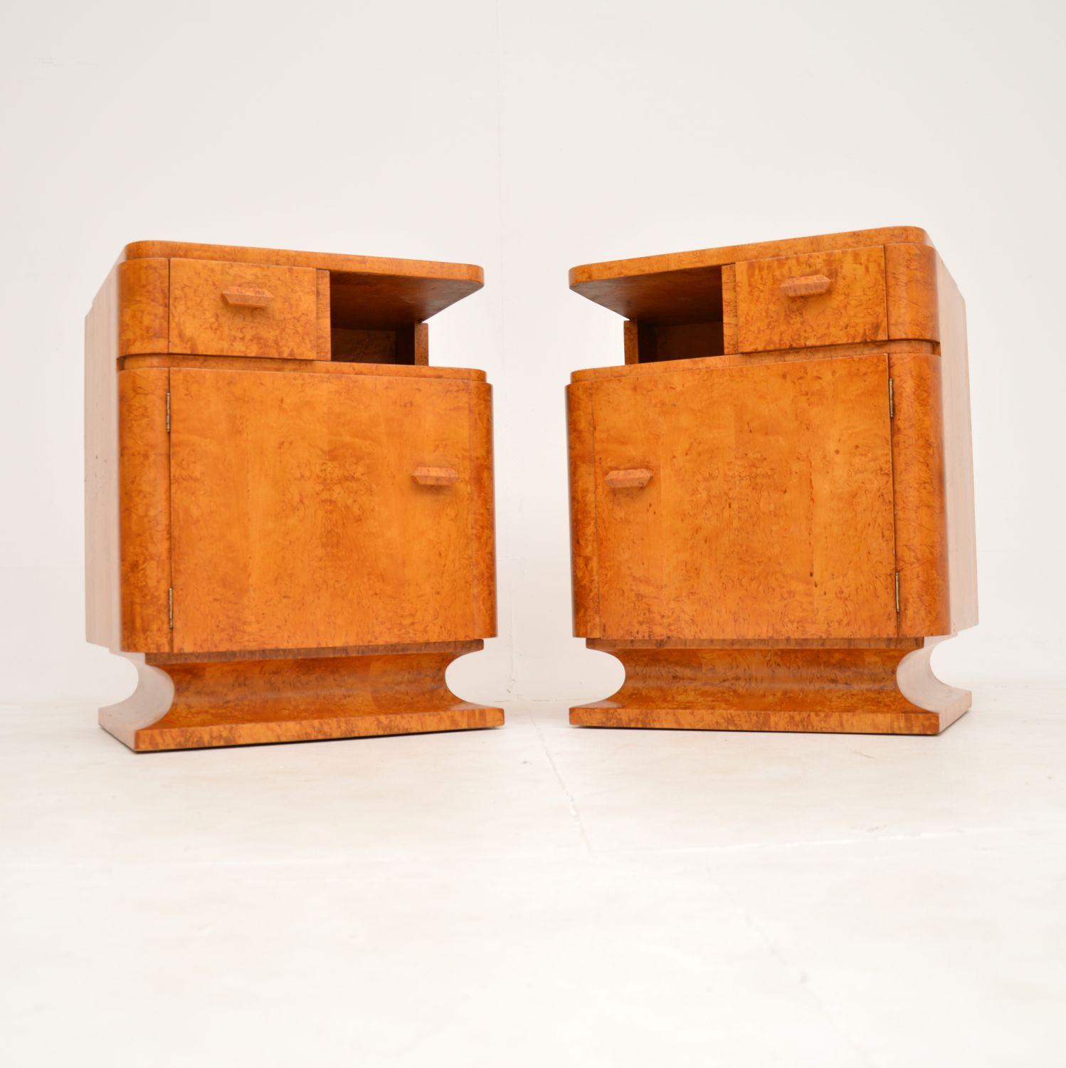 An absolutely stunning pair of original Art Deco period bedside cabinets in birds eye maple. These were made in continental Europe, most likely Sweden. They were retailed in Harvey Nichols and have the original label, they date from the