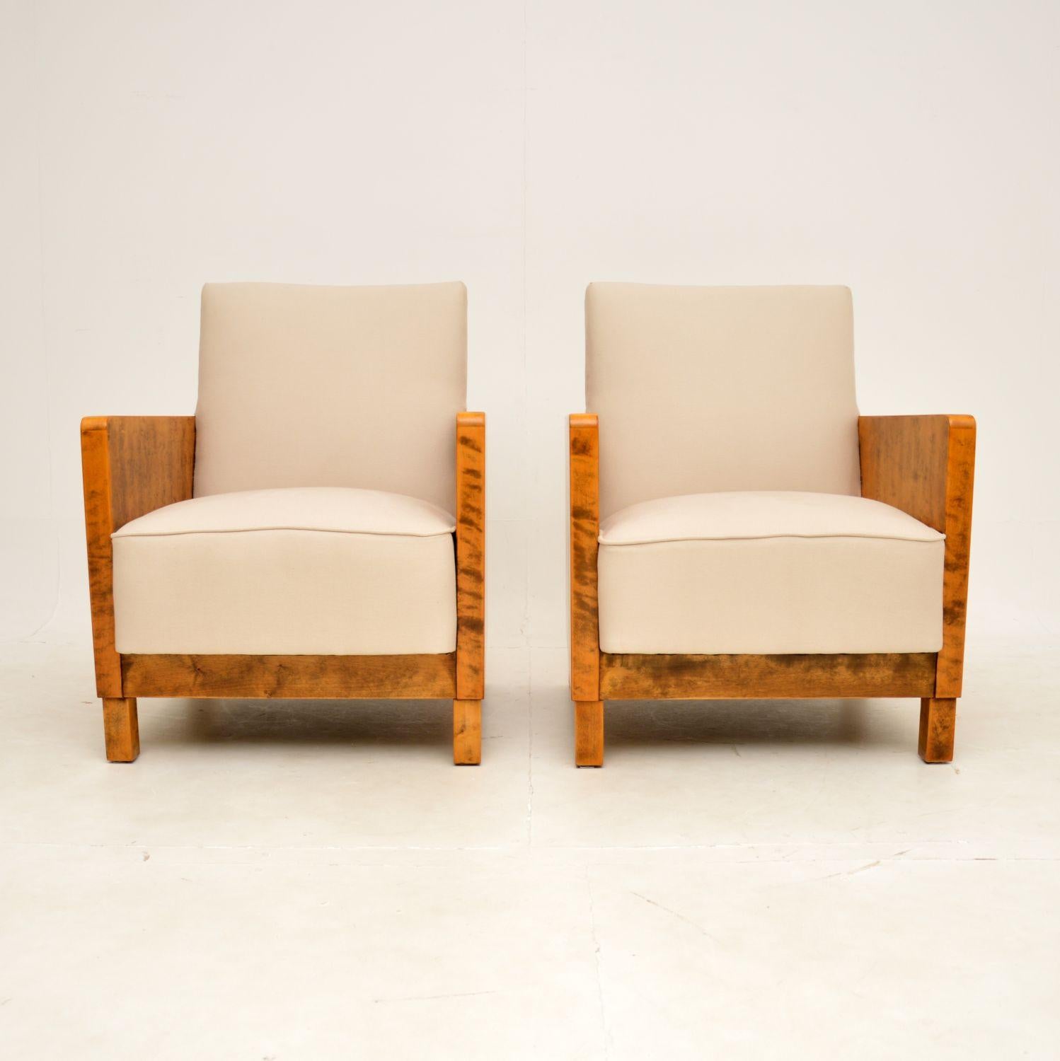 A stunning and extremely rare pair of Swedish Art Deco armchairs, designed by Axel Larsson. They were recently imported from Sweden, and they date from the 1920-1930s.

The quality is outstanding, and they have an extremely stylish design. The