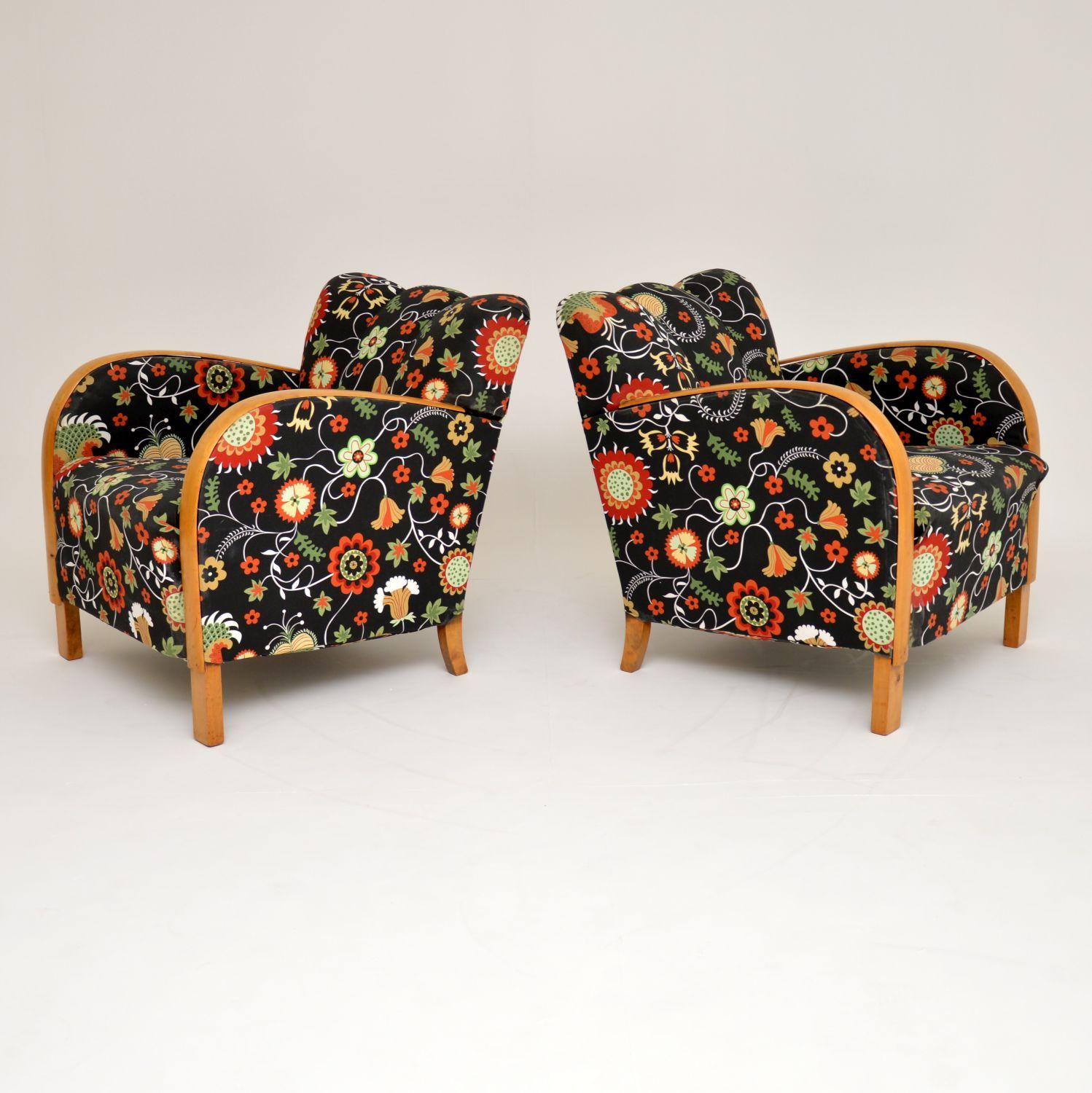 A beautiful pair of original Art Deco period armchairs. They were made in Sweden and they date from the 1920s-3190s. We import similar models regularly and usually re-upholster them in cream. This pair came in a stunning original vintage fabric
