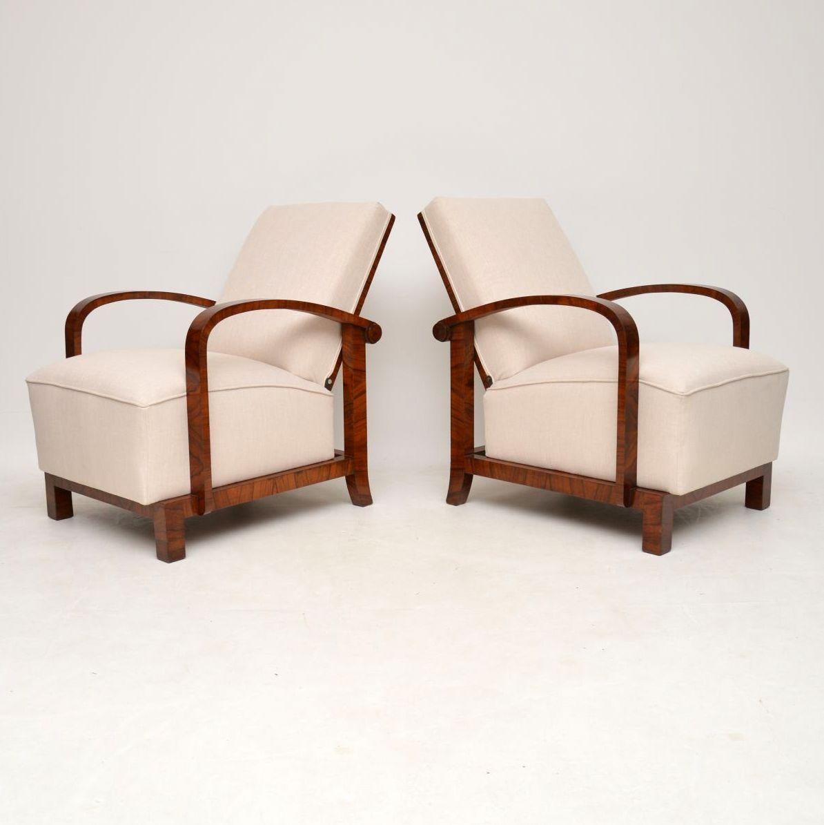 Very stylish pair of Swedish Art Deco walnut armchairs in good original condition and having just been re-upholstered in a cream fabric. They have fully sprung seats and the backs recline further. These armchairs date to circa 1930s