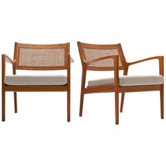 Pair of Swedish Beech and Cane Lounge Chairs by Karl Erik Ekselius