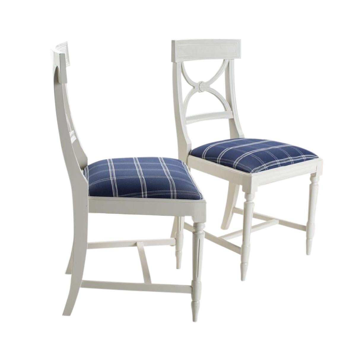 2 classic Swedish Gustavian Bellman chairs painted white with a classic check blue fabric. Chair measurements:
Width: 47cm / 19