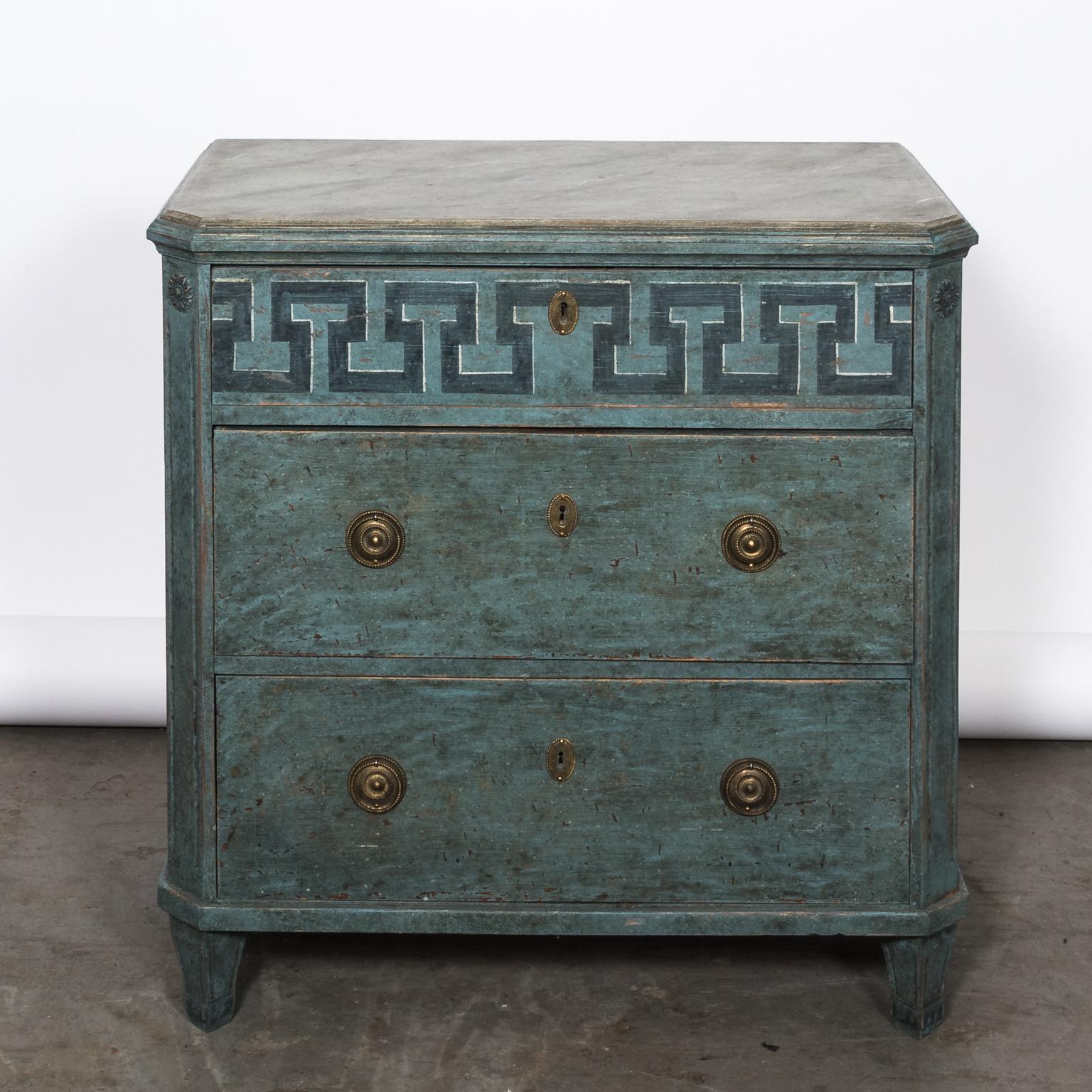 Pair of Swedish blue painted commodes in the Gustavian style with Greek key trim and brass hardware, circa 19th century.