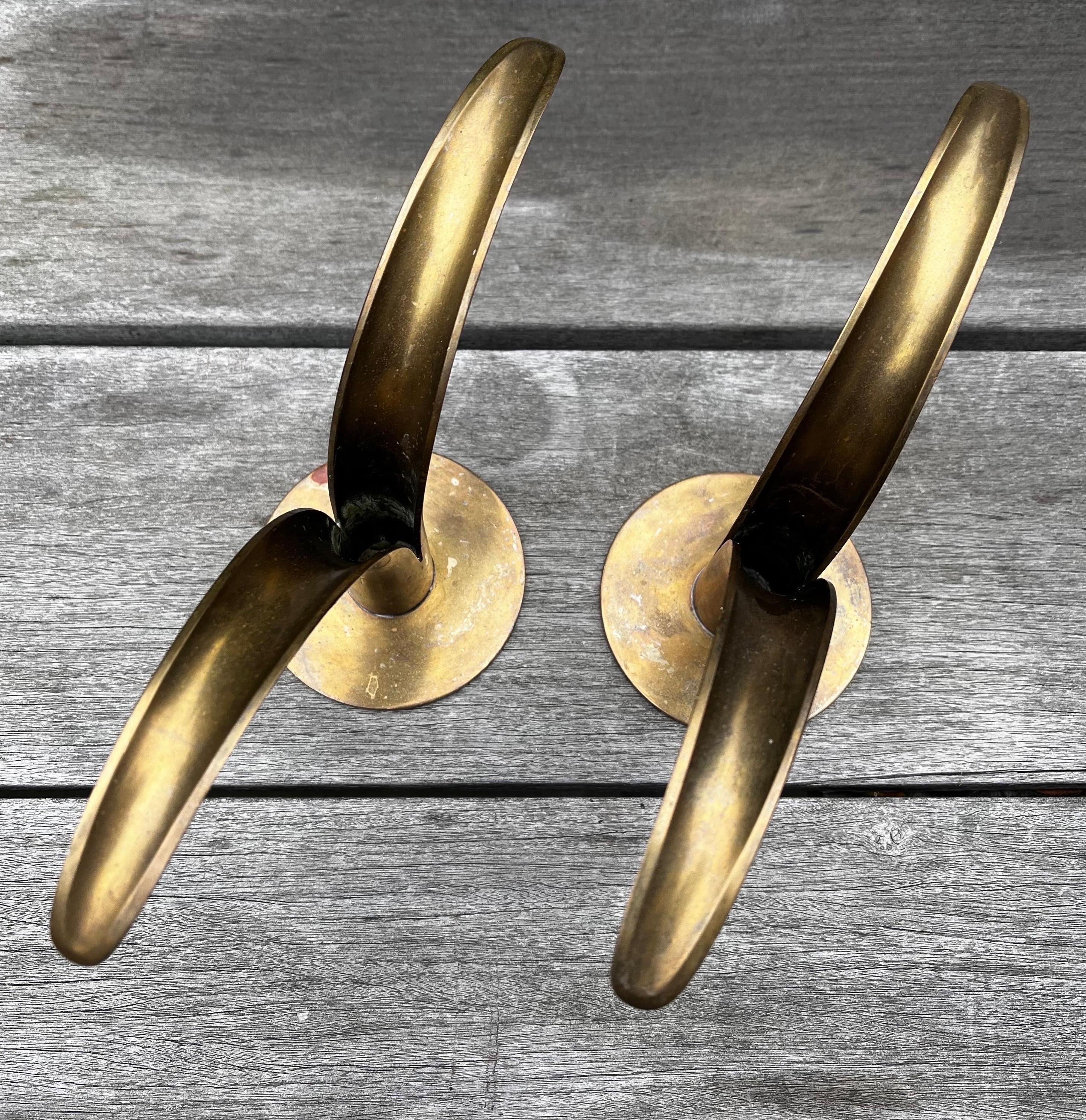 Pair of Swedish Brass Candleholders by Ivar Alenius Bjork for Ystad Metal.  In Good Condition For Sale In Philadelphia, PA