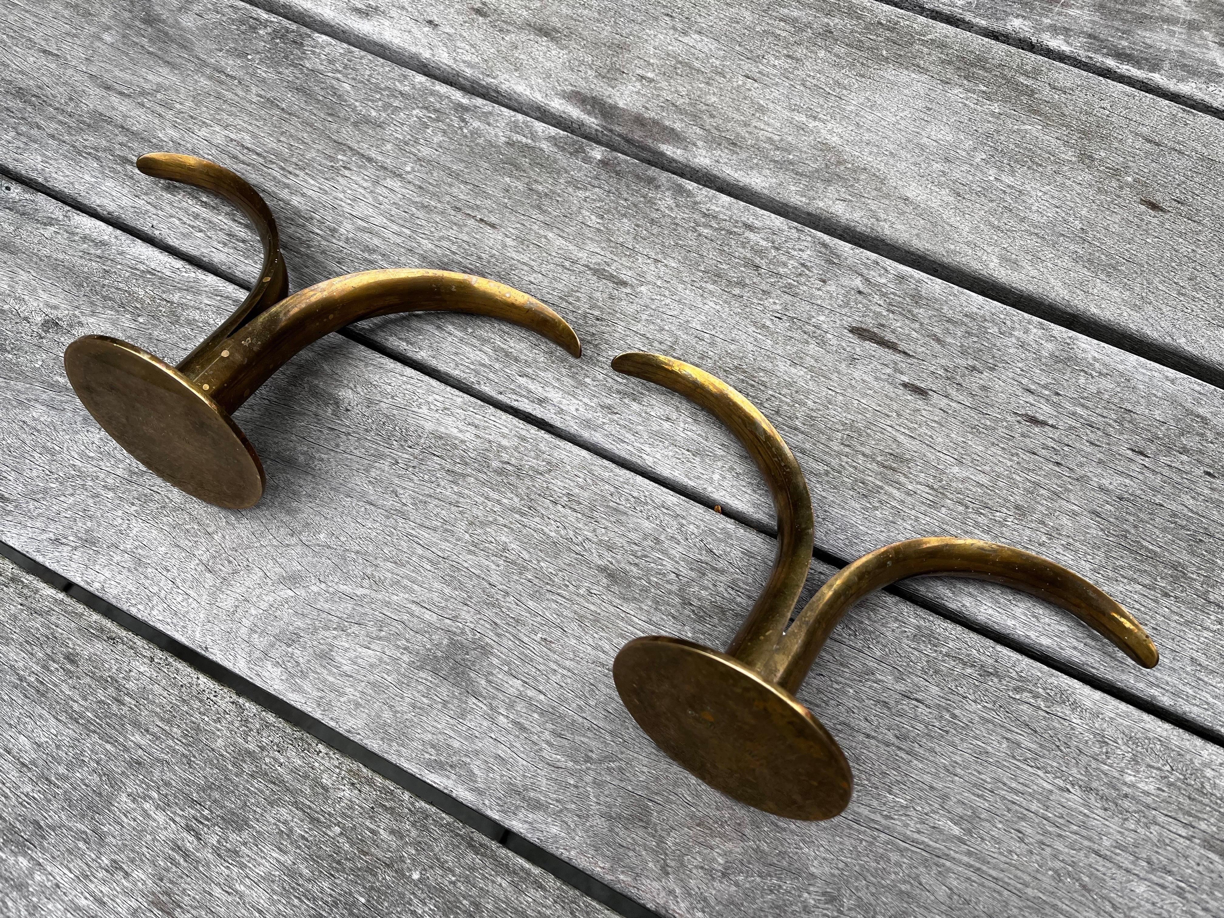20th Century Pair of Swedish Brass Candleholders by Ivar Alenius Bjork for Ystad Metal.  For Sale