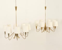 Pareja de candelabros suecos de latón con ocho brazos, años 50