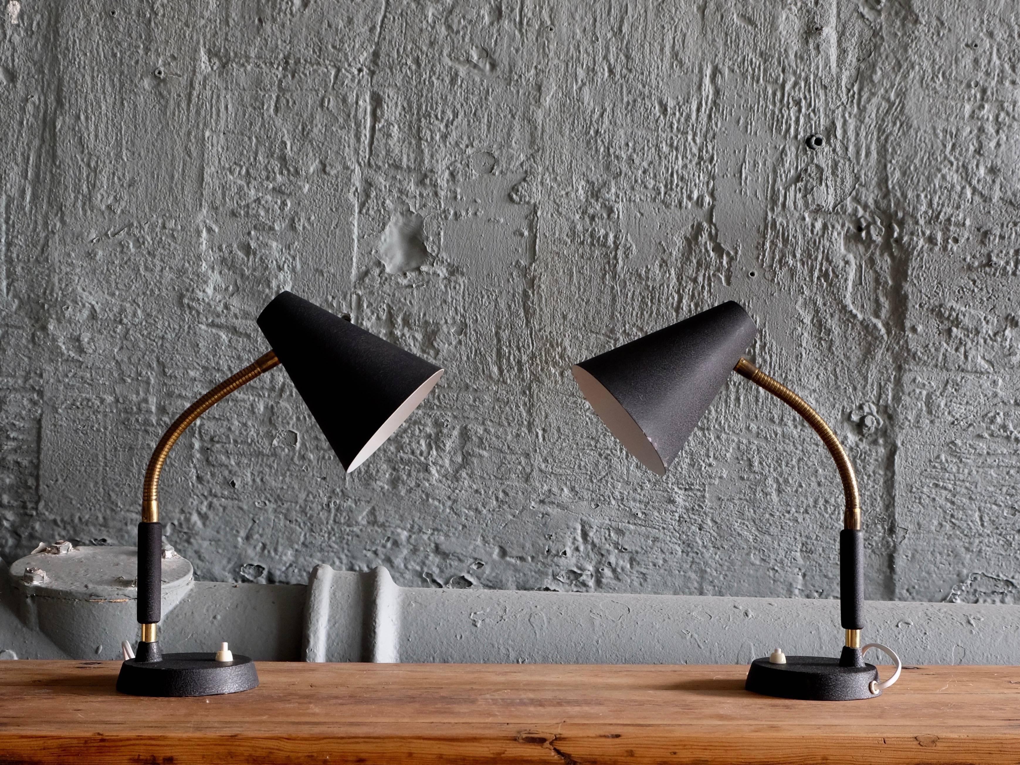 Black lacquered steel and brass.
With signs of usage and patina.
Produced in Sweden, 1950s.