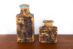 Pair of Swedish Brutalist stoneware vases with glazed collar, Curt Magnus-Addin.