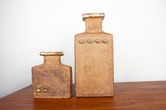Pair of Swedish Brutalist stoneware vases with glazed collar, Curt Magnus-Addin.