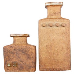 Pair of Swedish Brutalist stoneware vases with glazed collar, Curt Magnus-Addin.