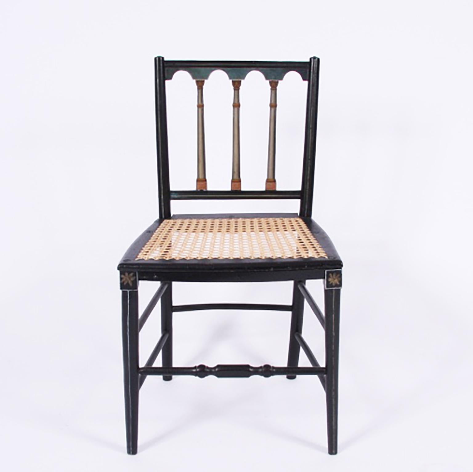 Swedish 19th century

A lovely pair of 19th century, Swedish, dining chairs with caned seats, ebonised and polychrome.