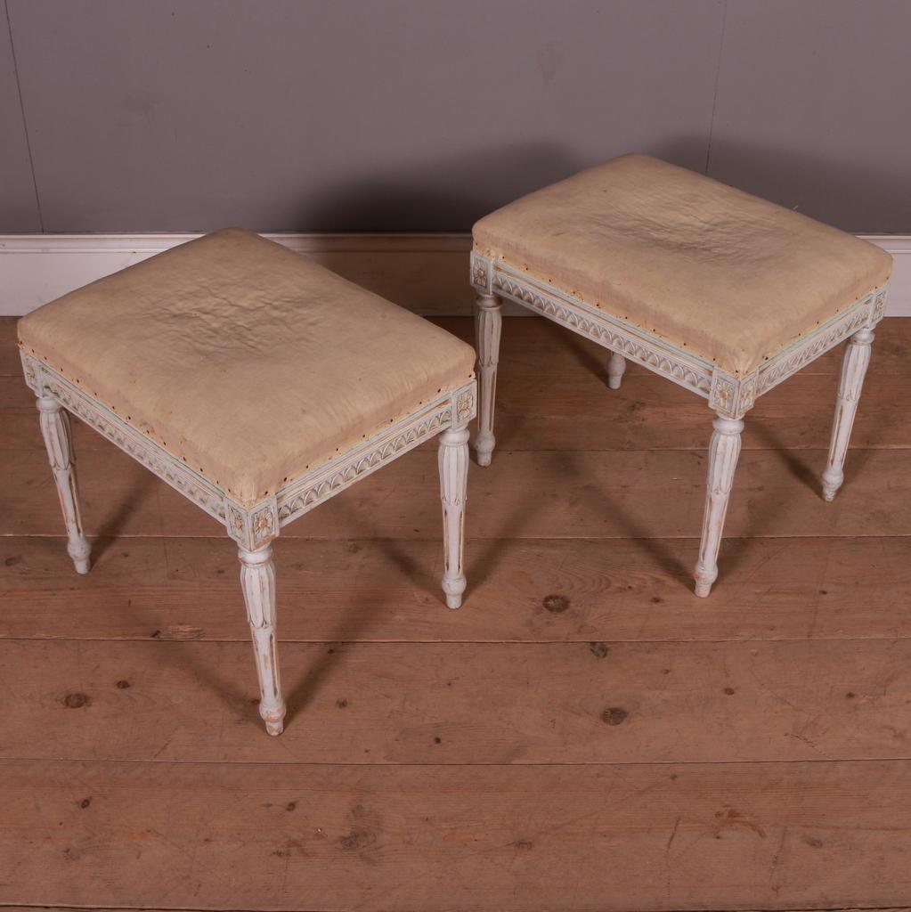 Pair of late 19th C Swedish carved stools. Old worn paint. 1890.

Dimensions
19 inches (48 cms) wide
14.5 inches (37 cms) deep
17.5 inches (44 cms) high.