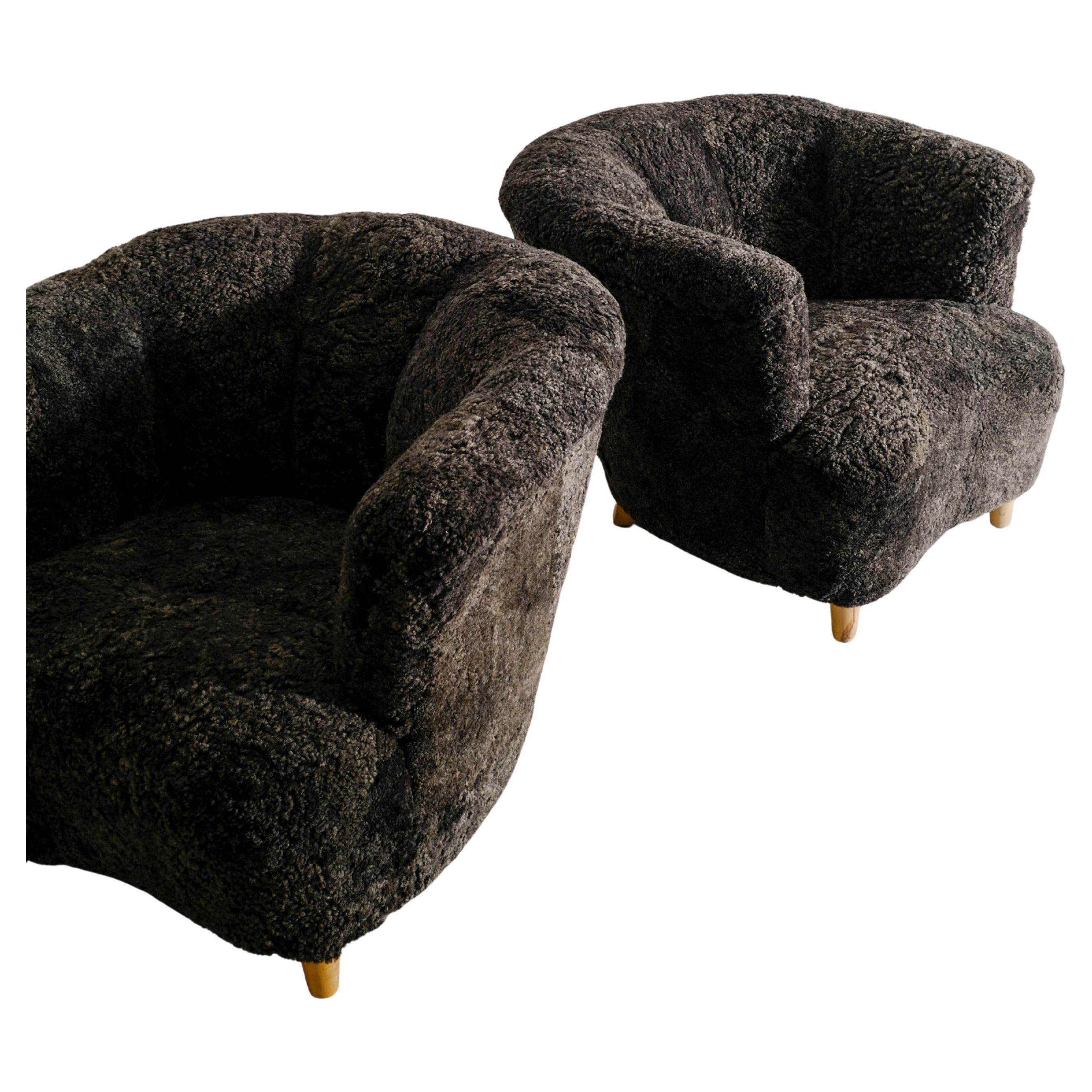 Pair of Swedish Curved Arm Easy Chairs in Charcoal Sheepskin Produced, 1940s