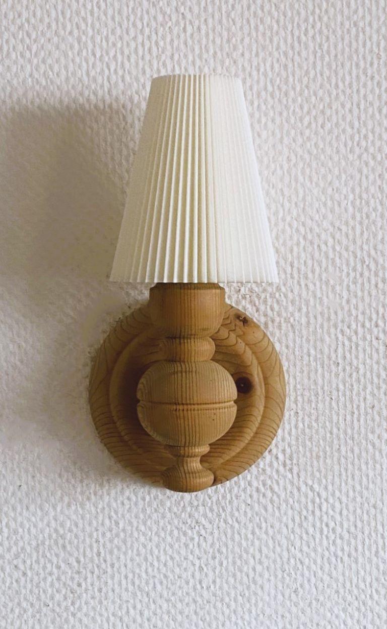 Hand-Carved Pair of Swedish Designer Pine Wall Sconces with Pleated Shades, Sweden, 1950s