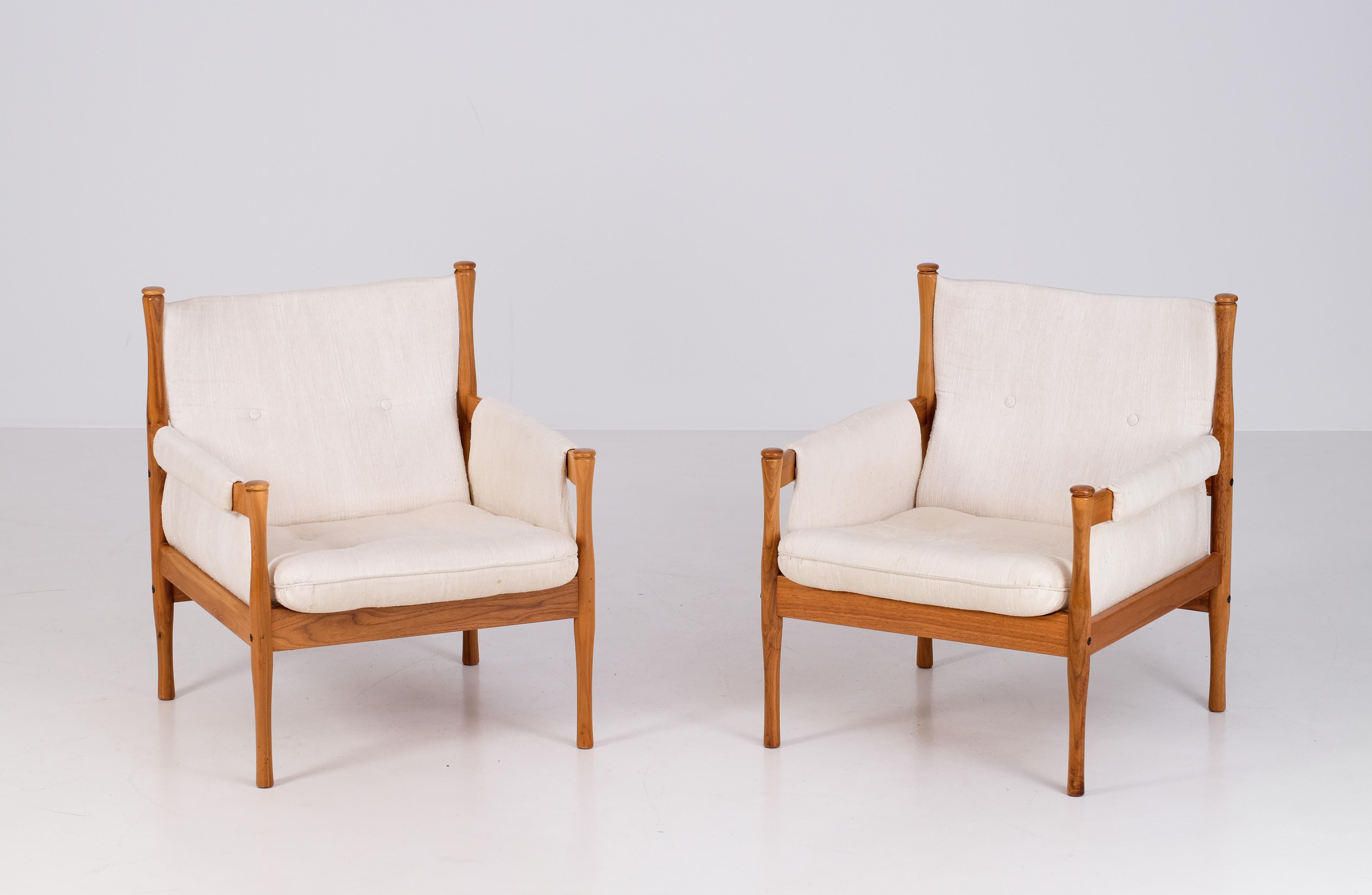 Beautiful pair of Swedish easy chairs, produced in Sweden 1960s. 
beechwood and fabric.