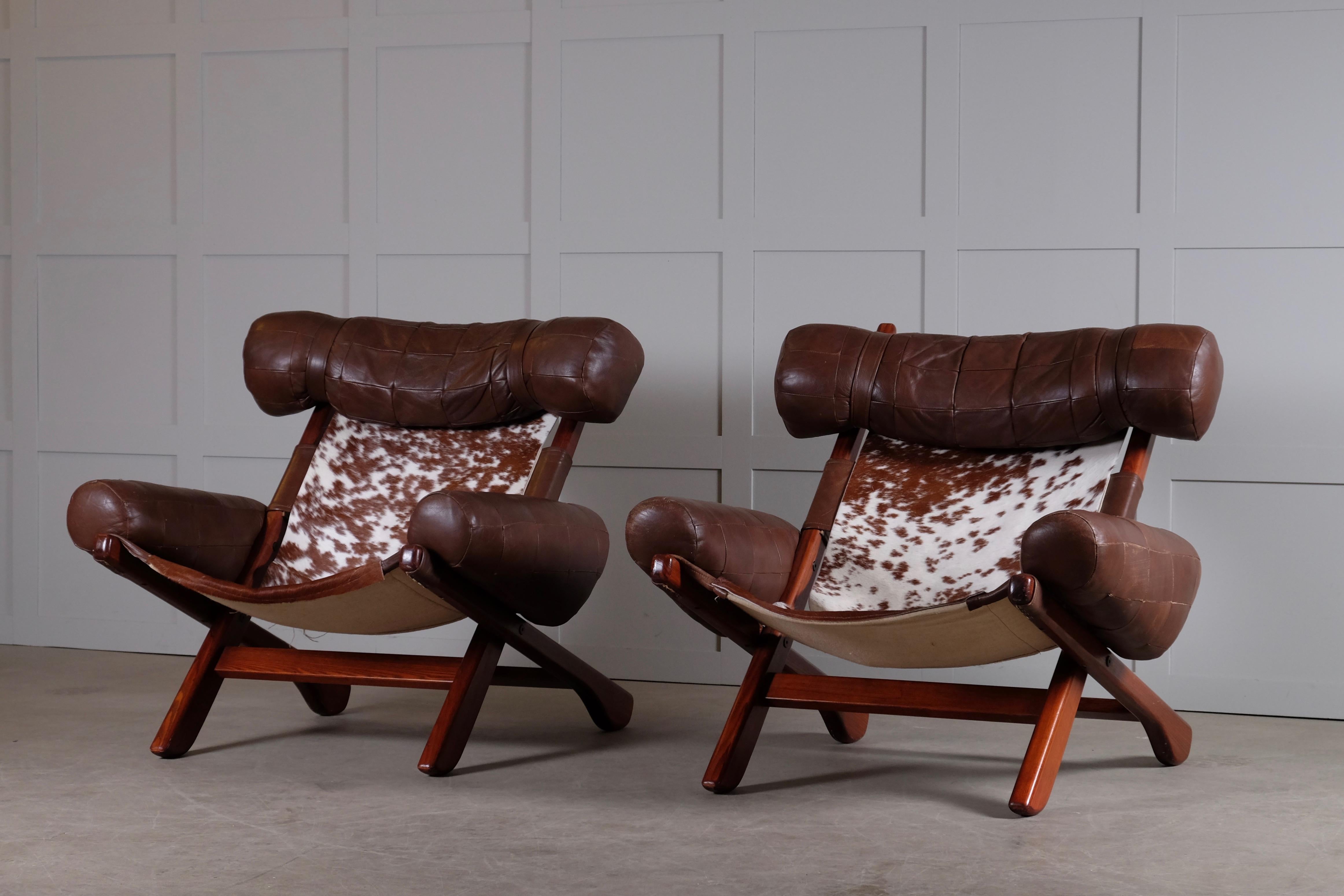 Produced in Sweden, 1970s. Attributed to Arne Norell.
Dark stained beech and leather.