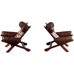 Pair of Swedish Easy Chairs with Cowhide, 1970s