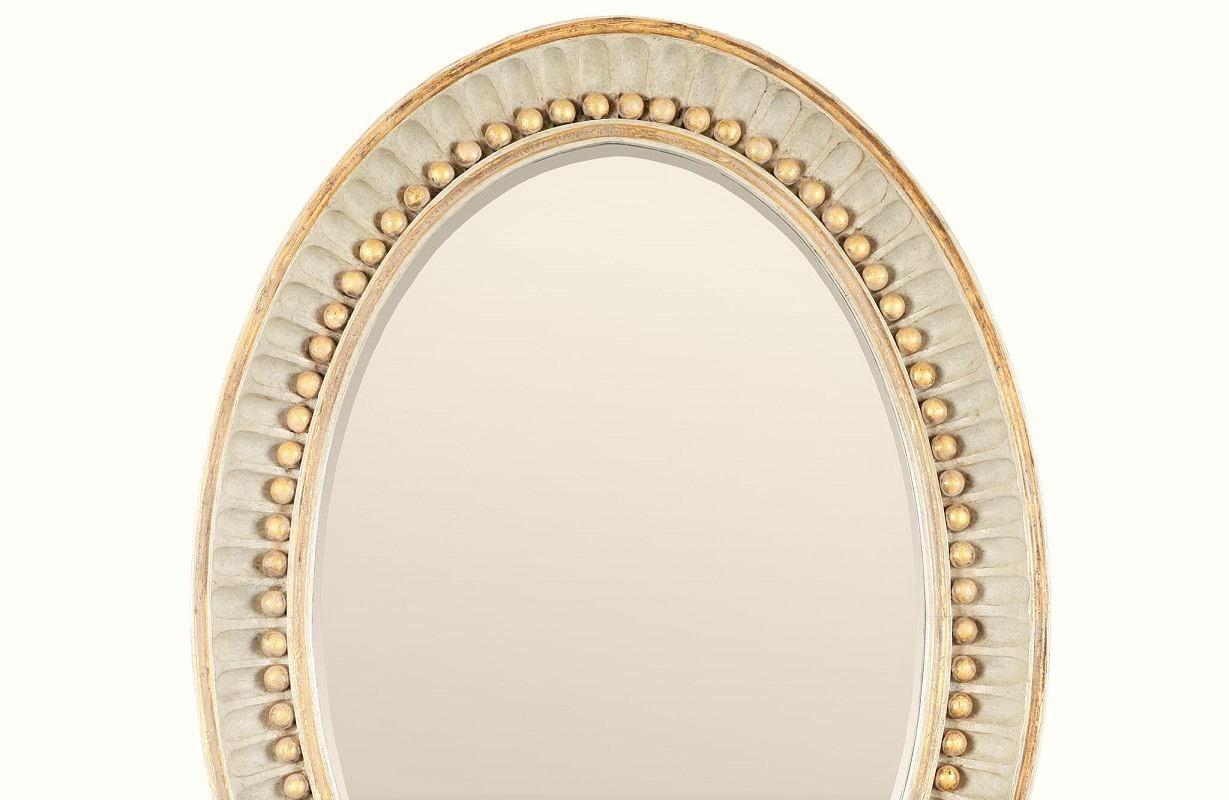 Pair of Swedish Empire neoclassical oval mirrors by Charles Pollock for William Switzer.