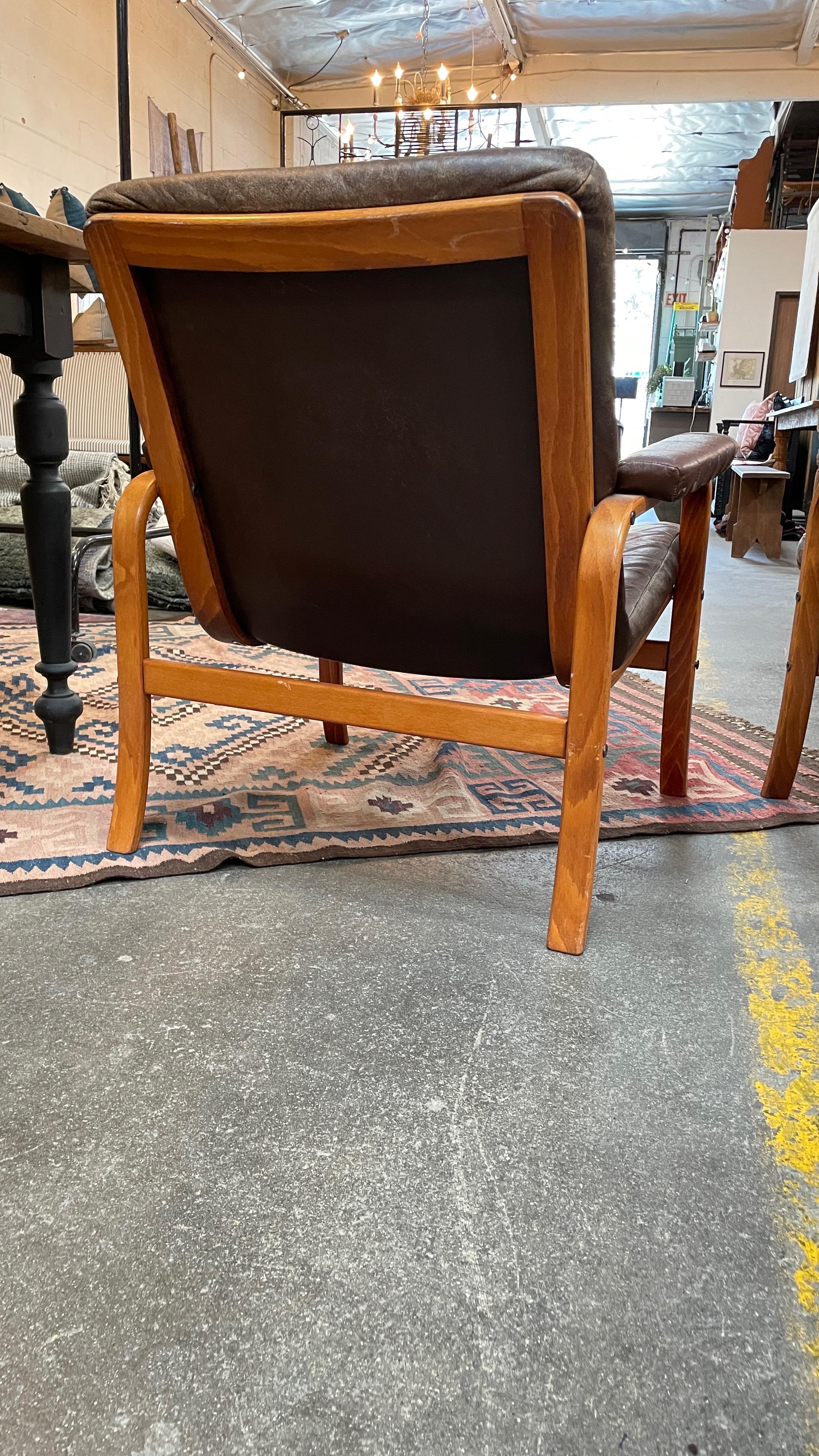 This amazing pair of Swedish Göte Möbler Nässjö leather chairs are everything you could want in vintage leather chairs. The perfect amount of distressing but still completely functional! 

The pair of Swedish Gote Movler leather chairs sit at 28