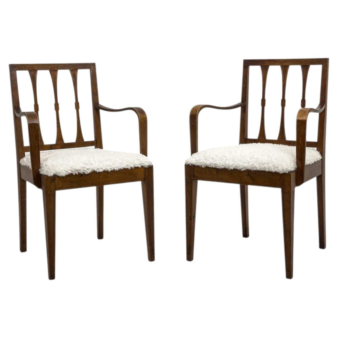 Pair of Swedish Grace Armchairs with Sculptural Laminated Armrests and Bouclé