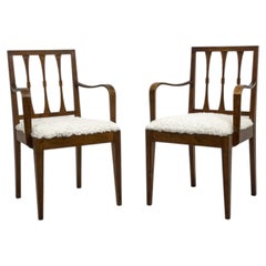 Pair of Swedish Grace Armchairs with Sculptural Laminated Armrests and Bouclé