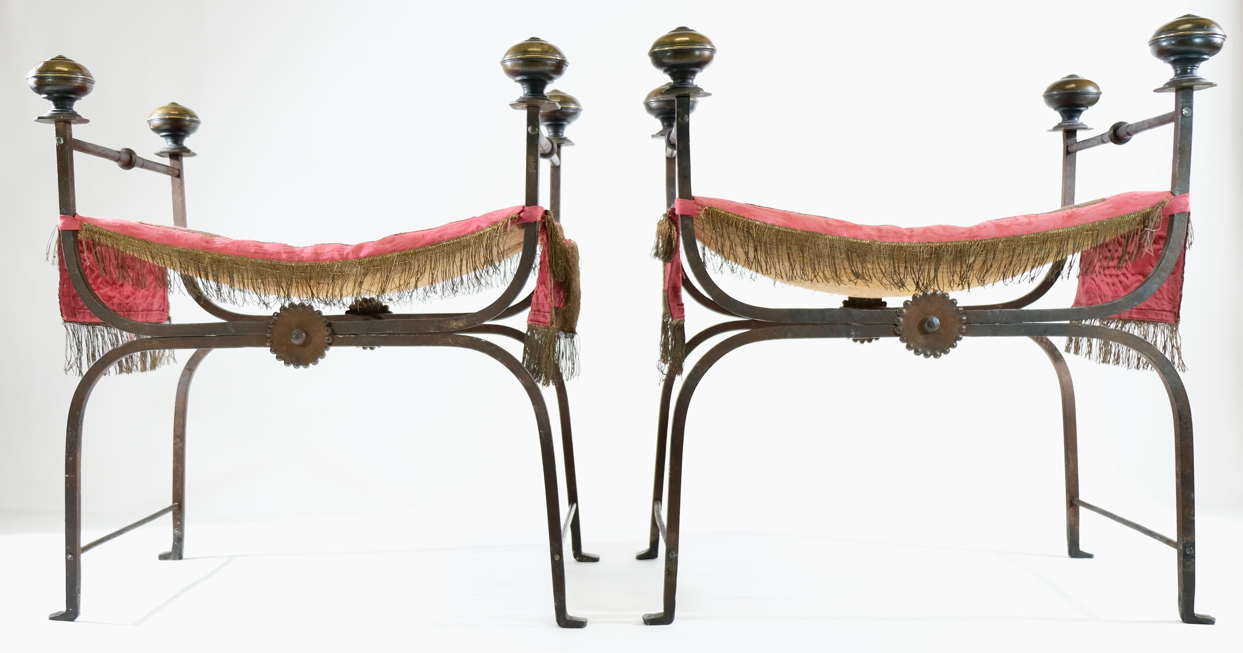 A pair of large iron foldable stools made in the 1920s. The design and the craftmanship is amazing. Swedish grace. Most probably made by Albin Stark for the Chines e Theatre in Stockholm, Sweden.
 