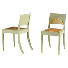 Pareja de Sillas Suecas Grace, Madera Pintada y Dorada, Asientos de Caña, Circa 1920