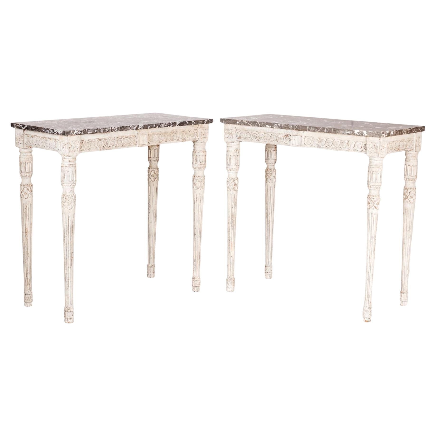 How many chairs fit around a 60-inch round table?