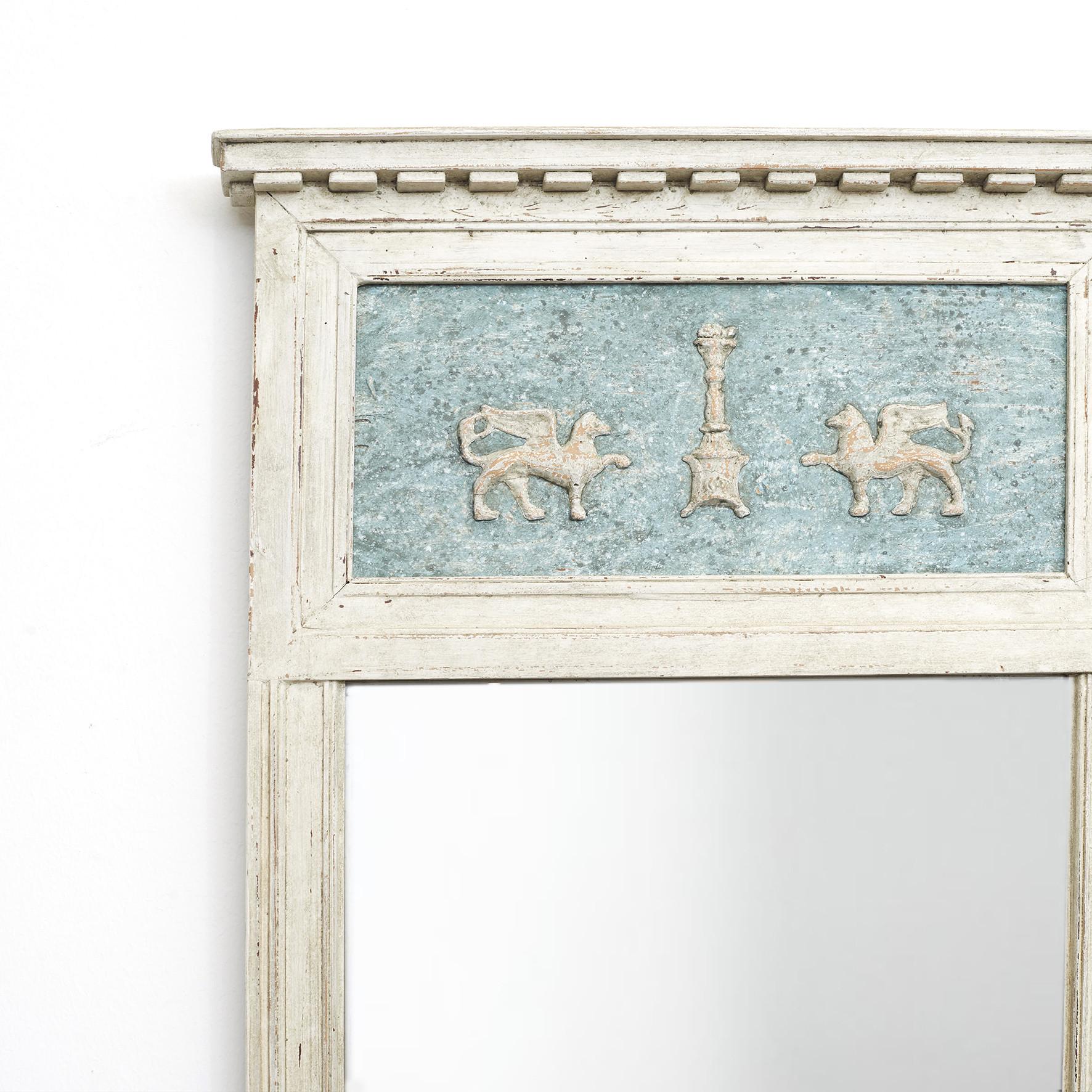 Pair of elegant and decorative Gustavian mirrors.
Later professionally repainted in antique blue and gray colors. Adorned with fabulous animals and garlands.
Sweden, circa 1810
Sold as a pair.